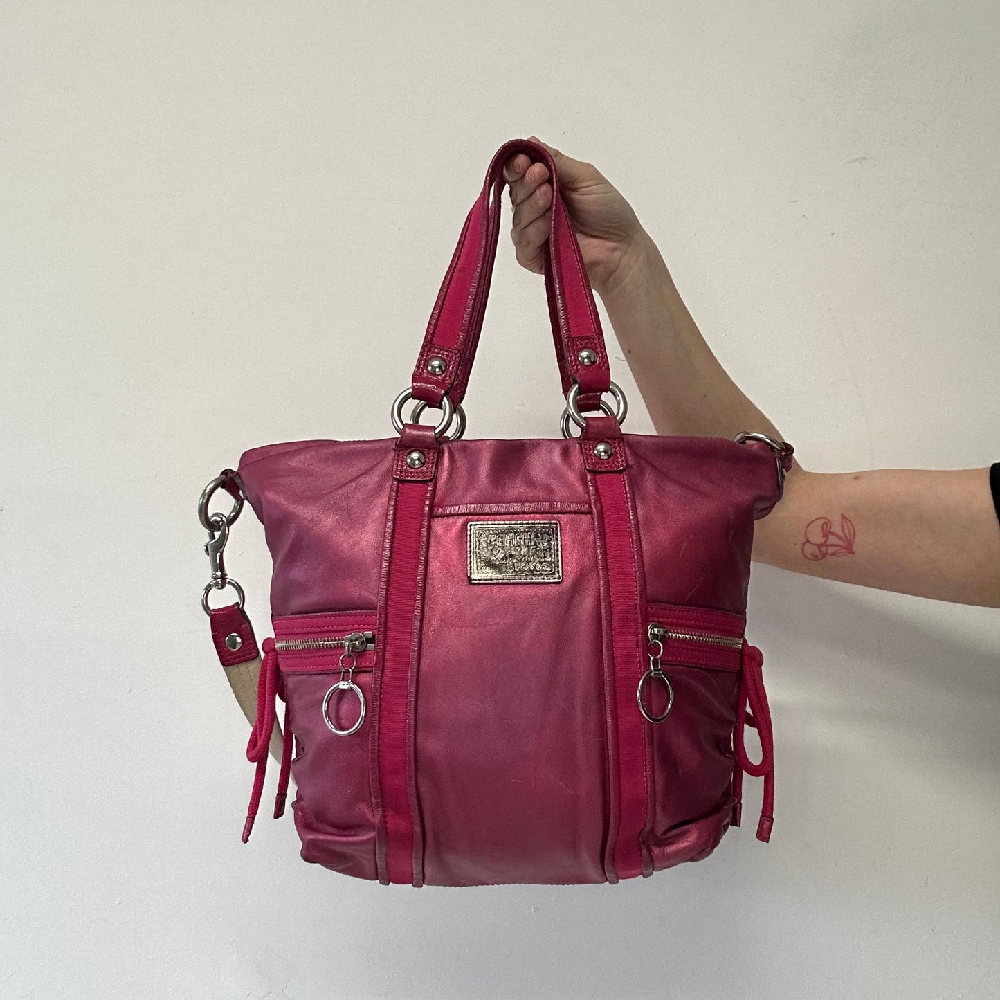 hot pink metallic shoulder bag