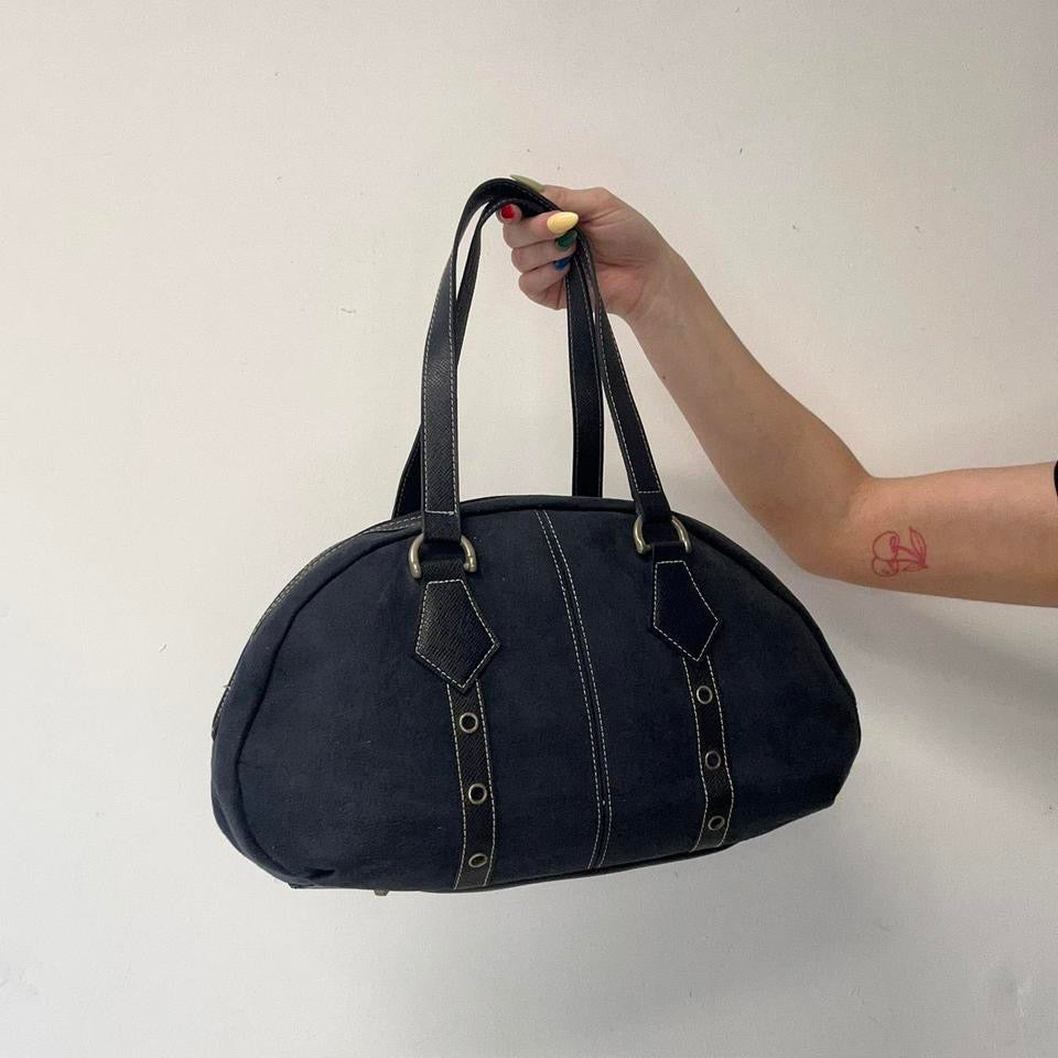 navy eyelet bowler shoulder bag