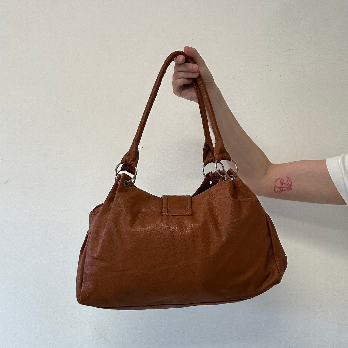 brown faux leather studded buckle shoulder bag