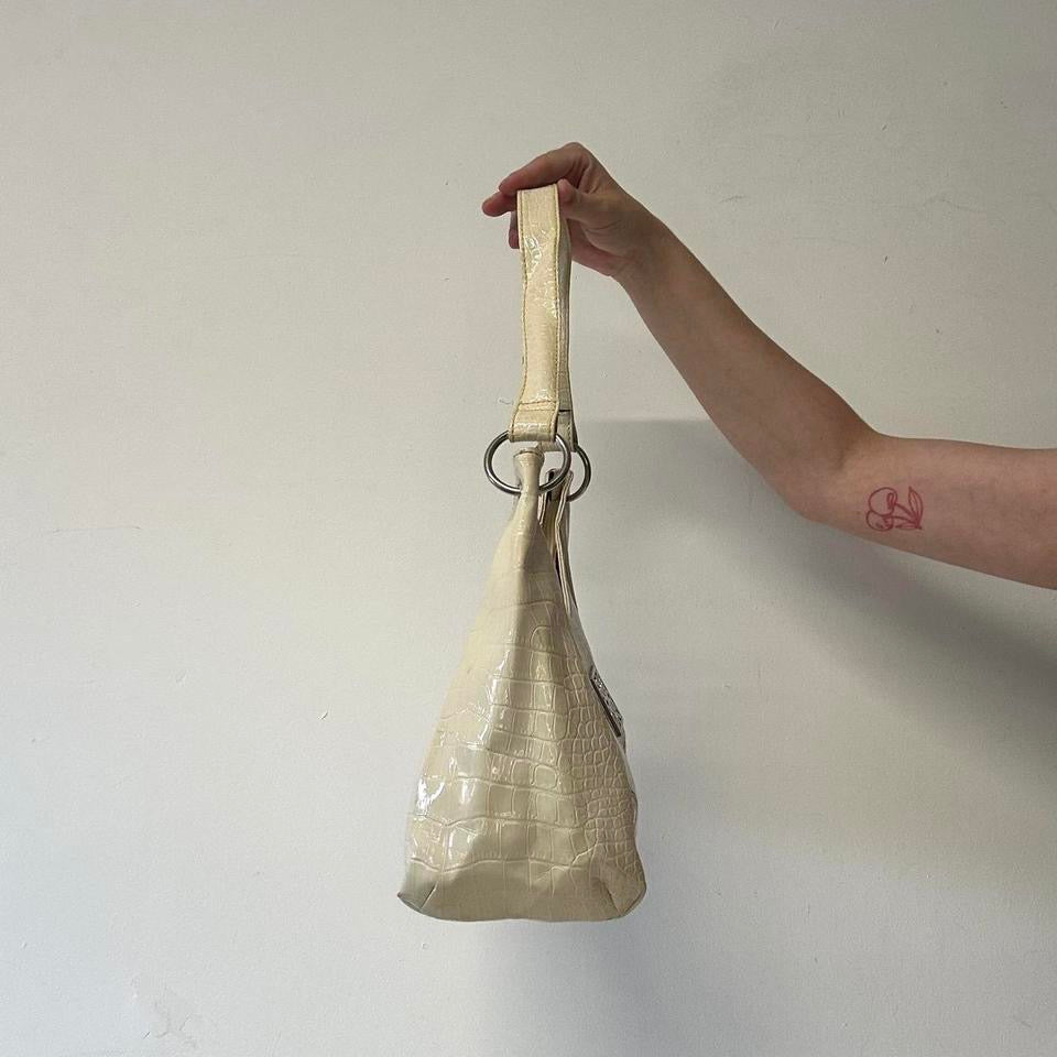 cream faux leather buckle effect shoulder bag