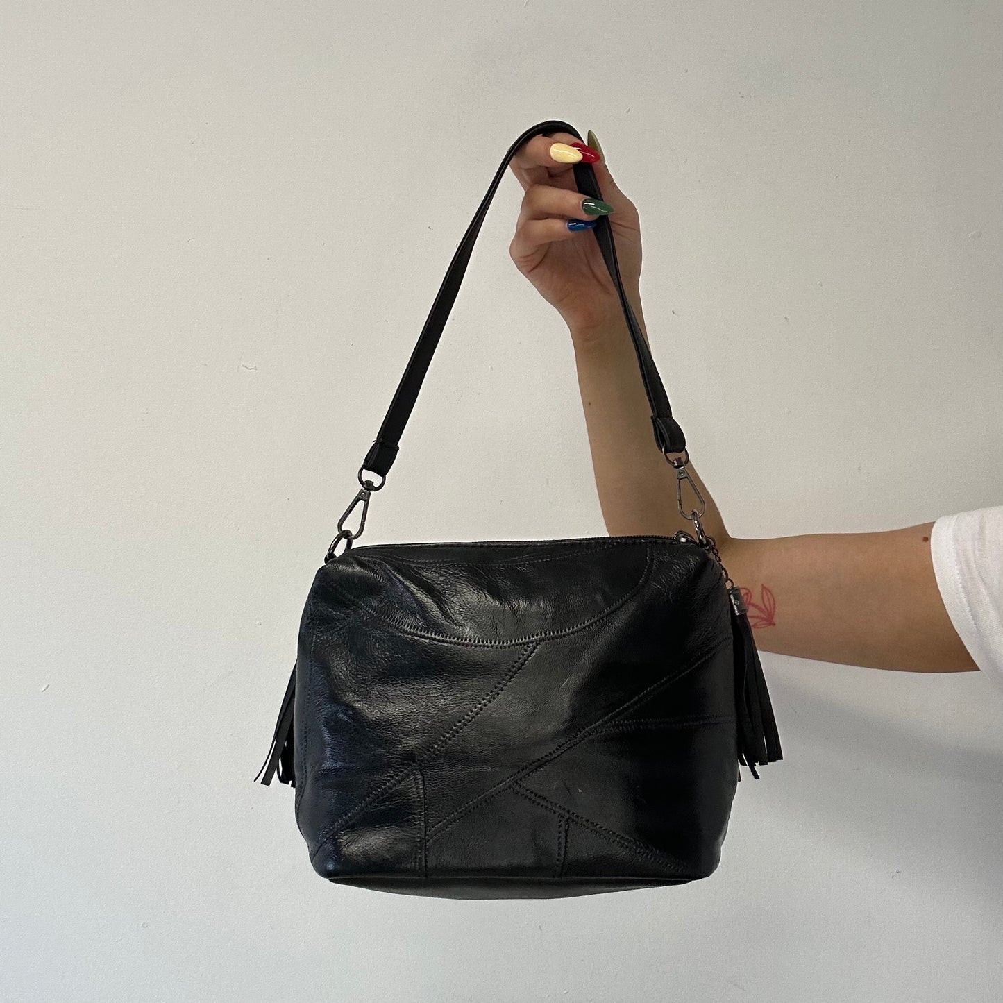 black faux leather studded shoulder bag