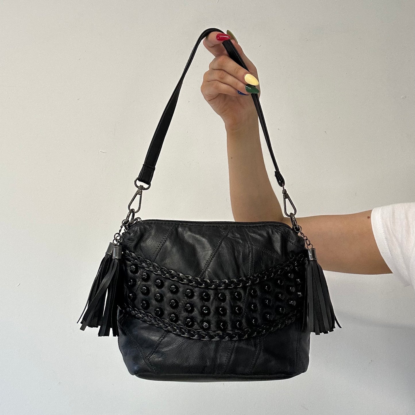black faux leather studded shoulder bag