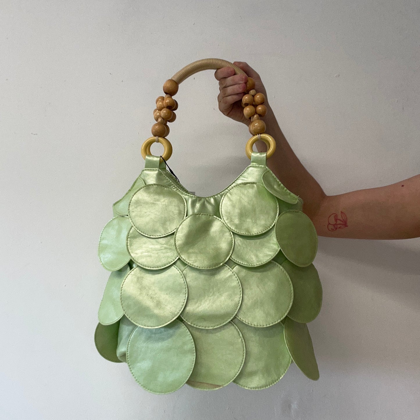 mint green faux leather disc beaded shoulder bag
