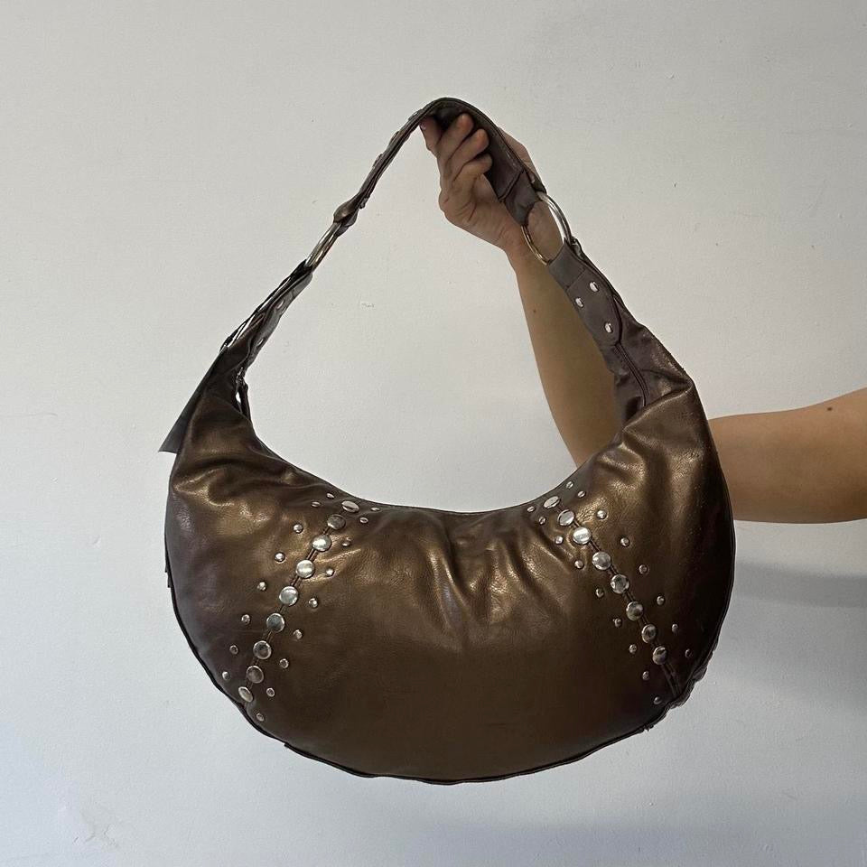 brown studded crescent faux leather shoulder bag