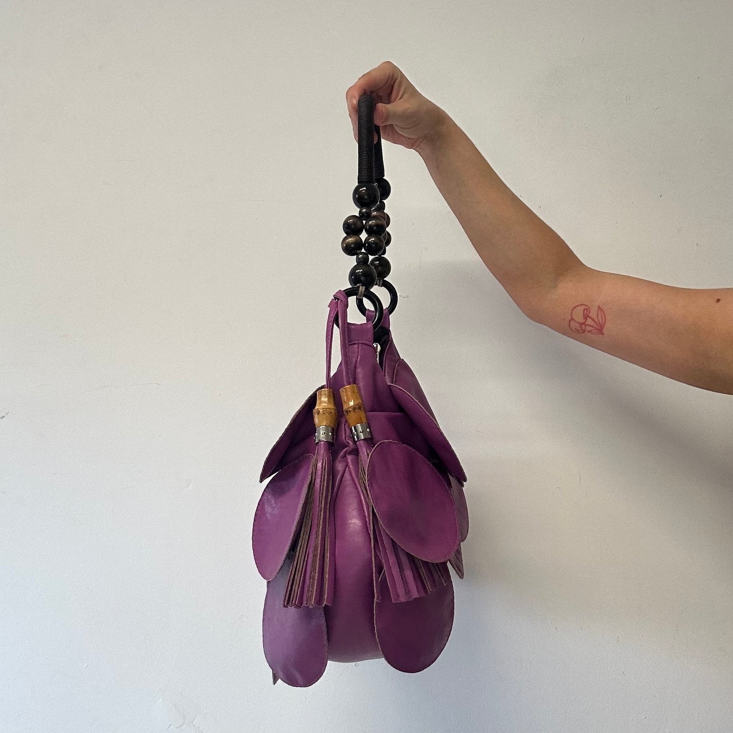purple faux leather disc beaded shoulder bag