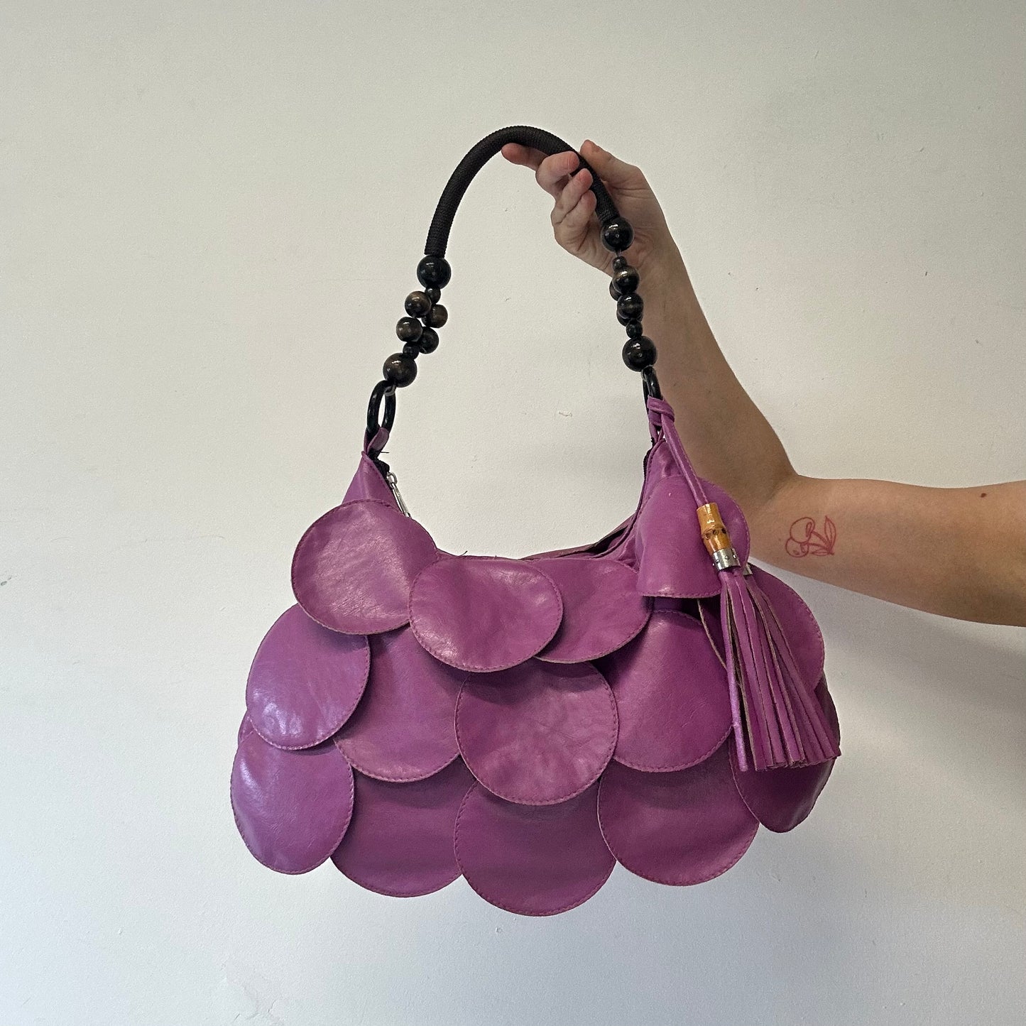 purple faux leather disc beaded shoulder bag