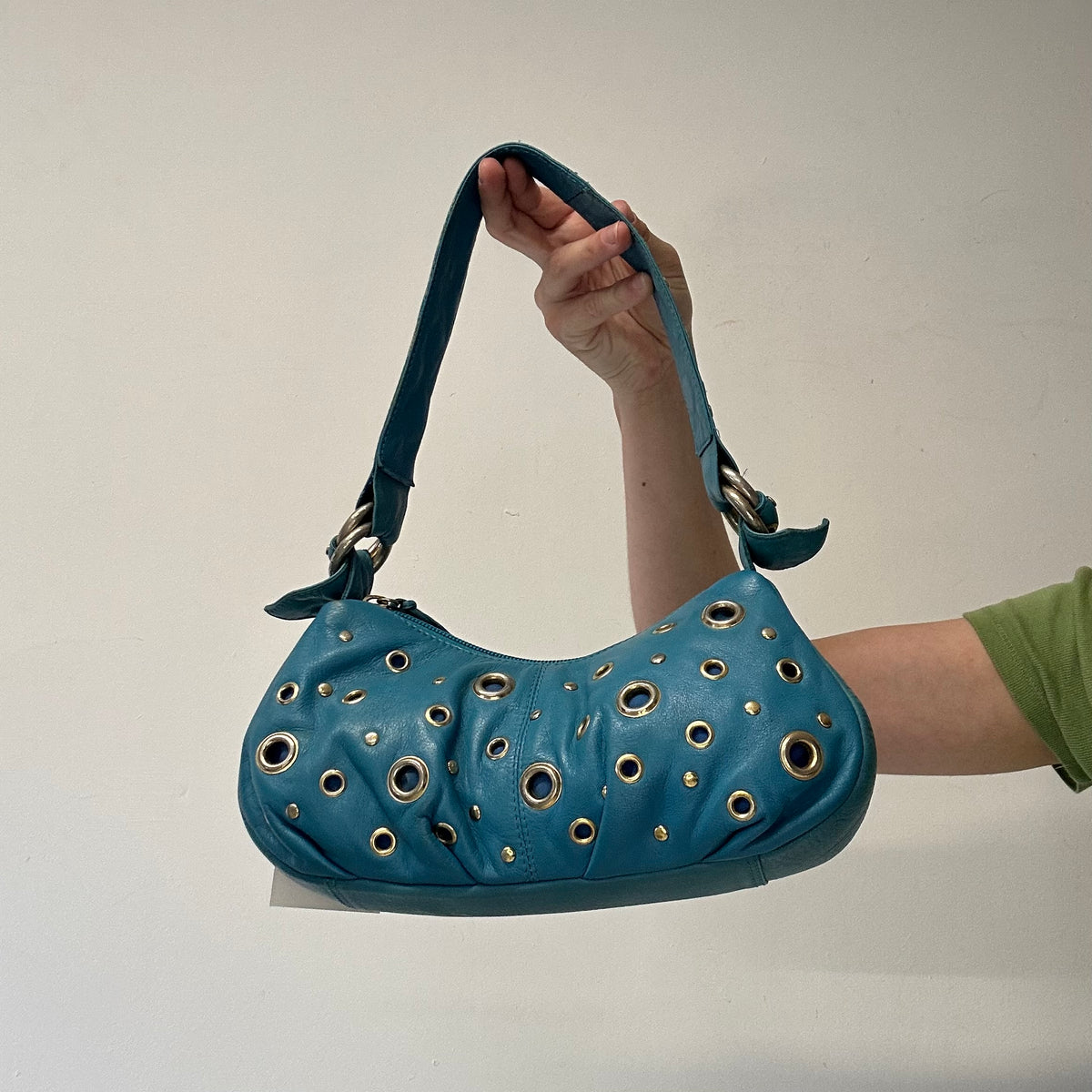 blue genuine leather eyelet shoulder bag