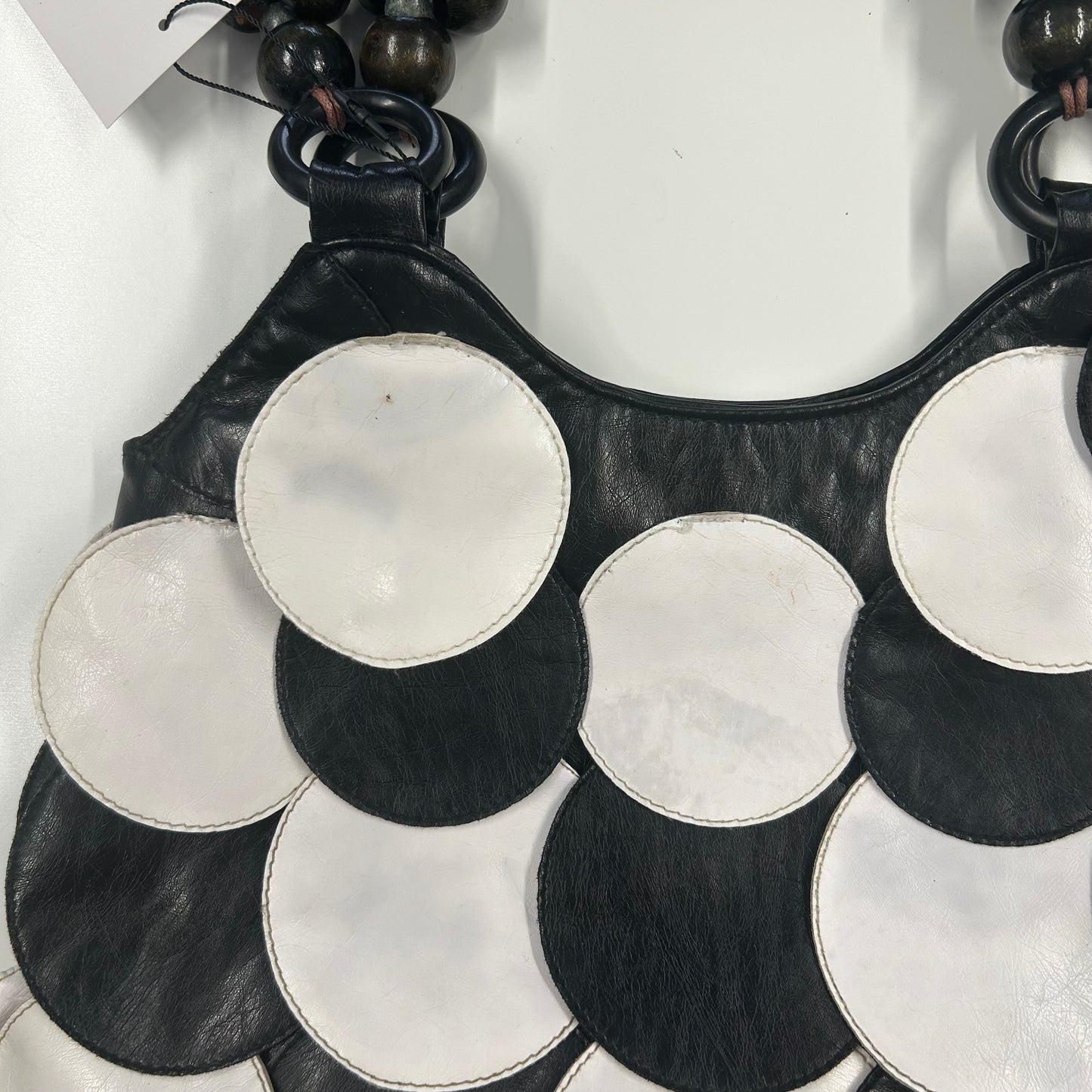 black and white faux leather disc beaded shoulder bag