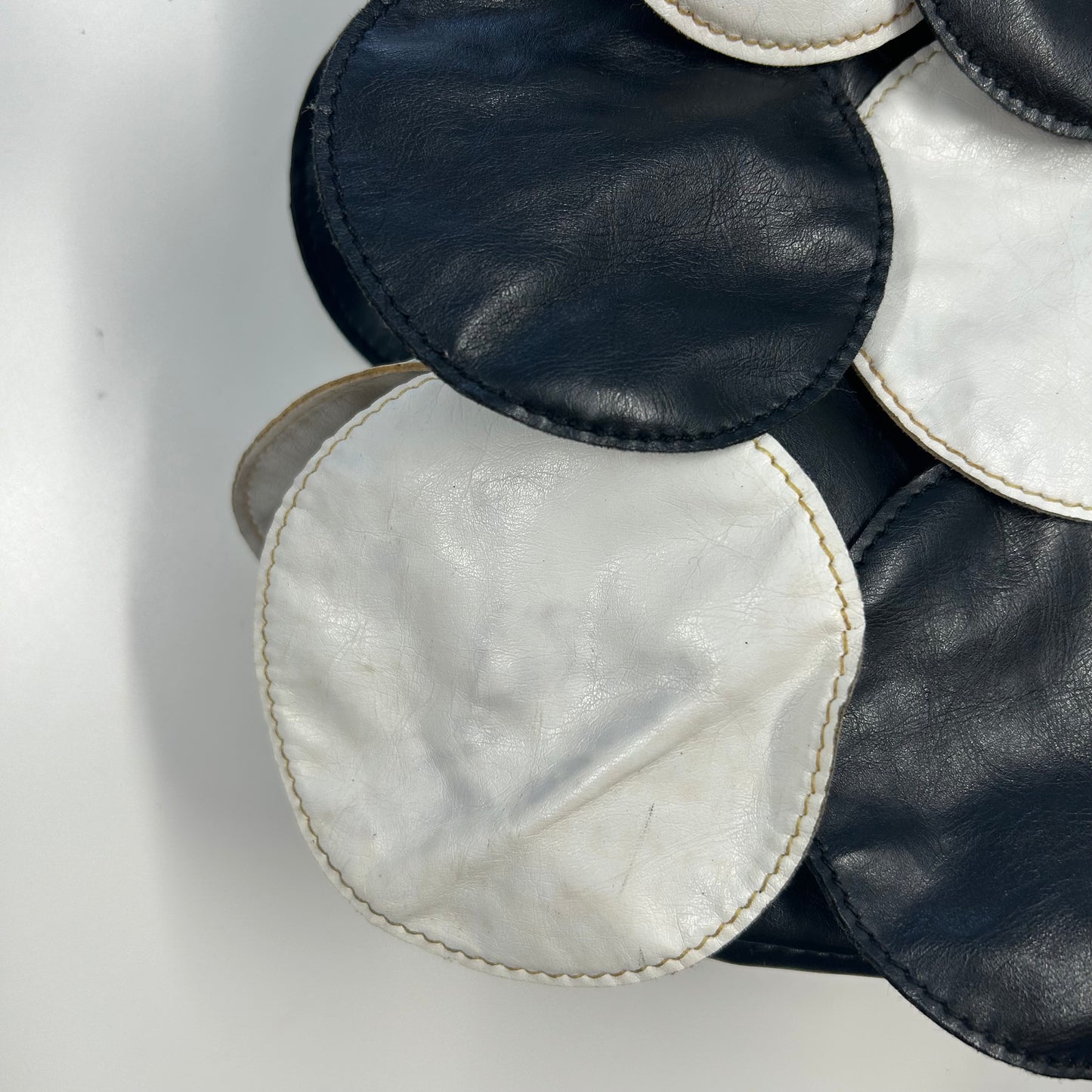 black and white faux leather disc beaded shoulder bag