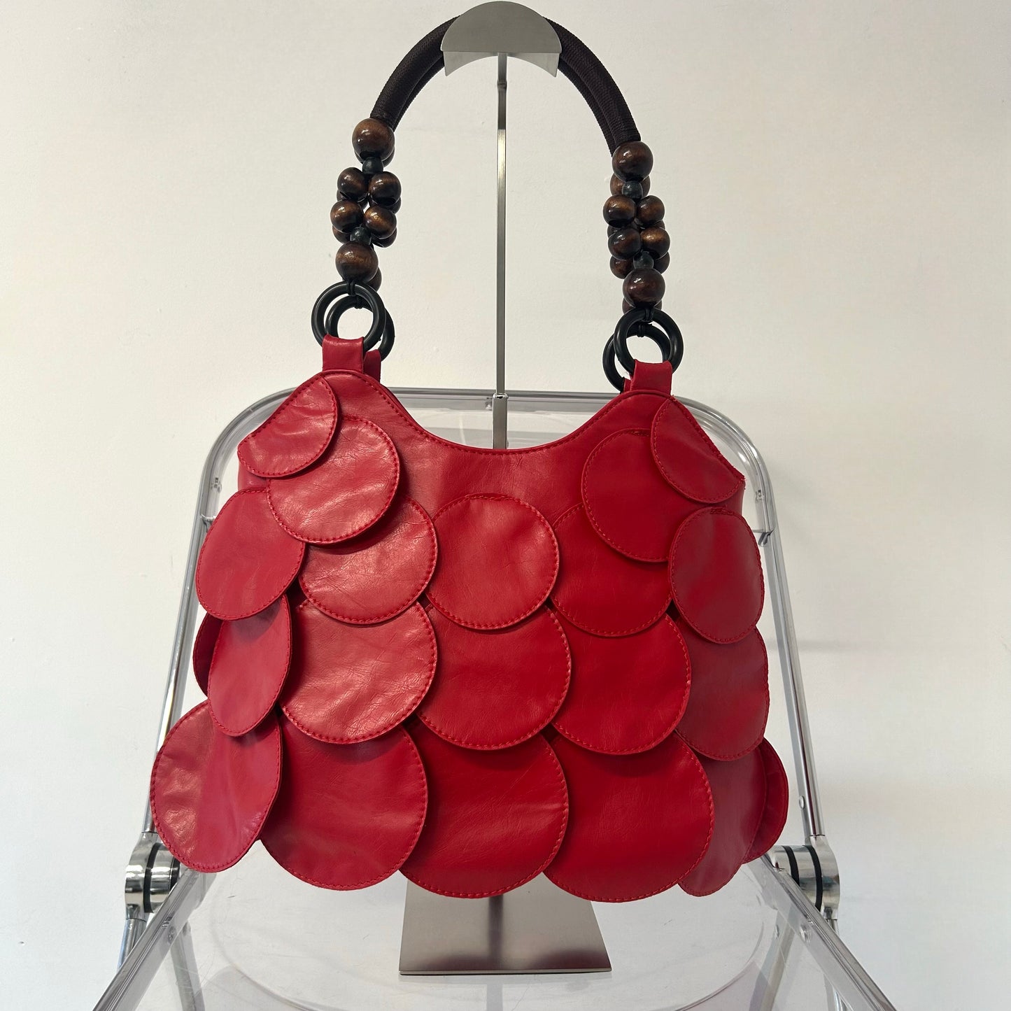 red faux leather disc beaded shoulder bag