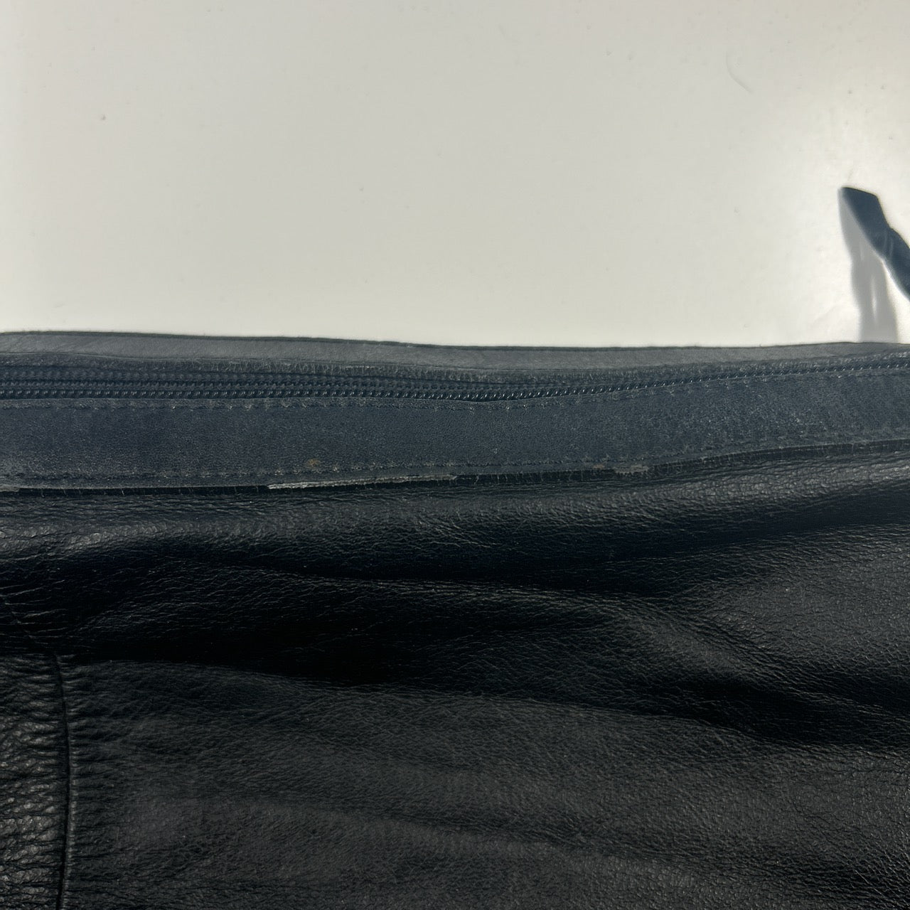 black faux leather large sling bag