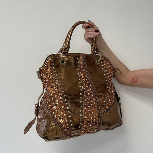 gold and bronze studded croc effect hand bag
