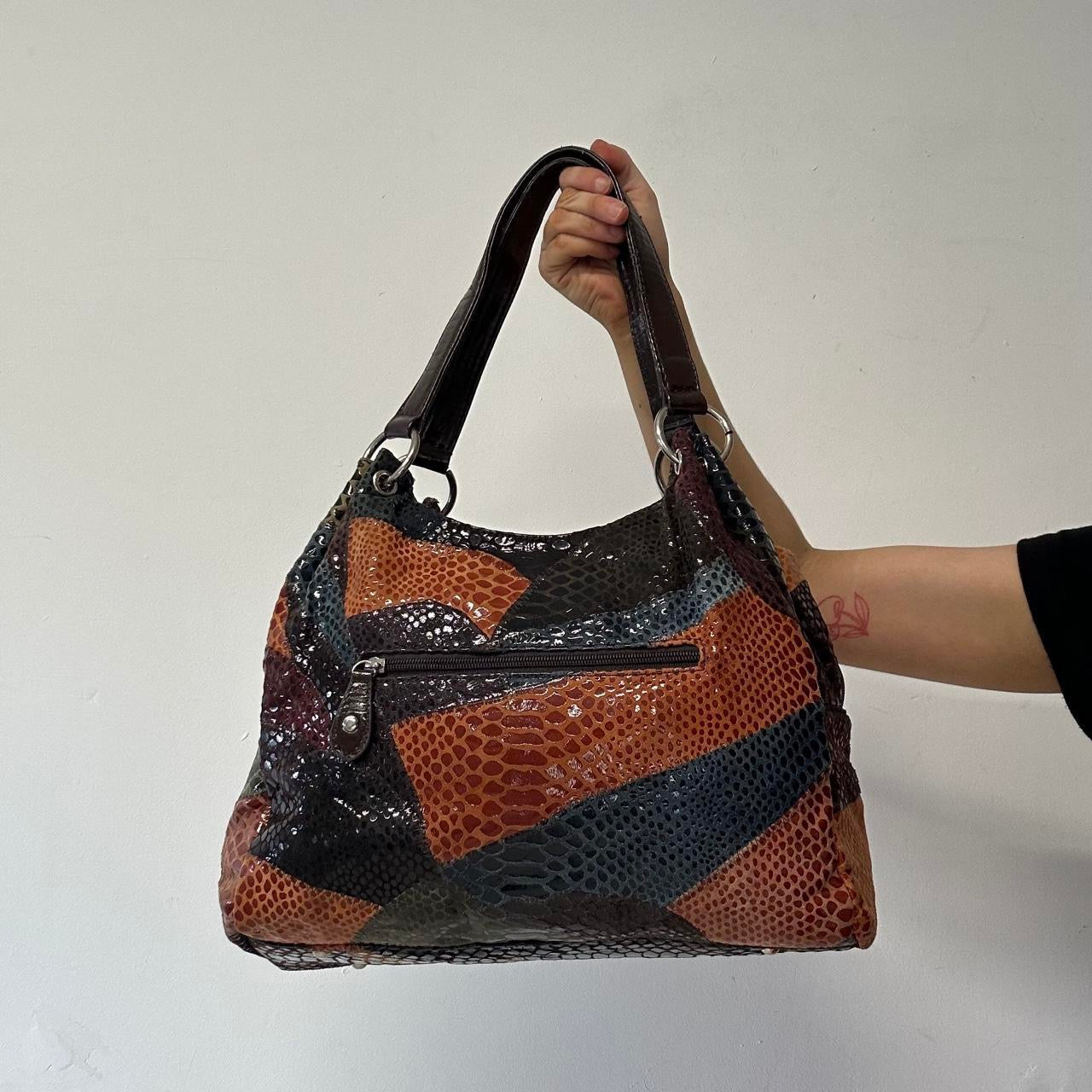 multicoloured patchworks studded faux leather shoulder bag