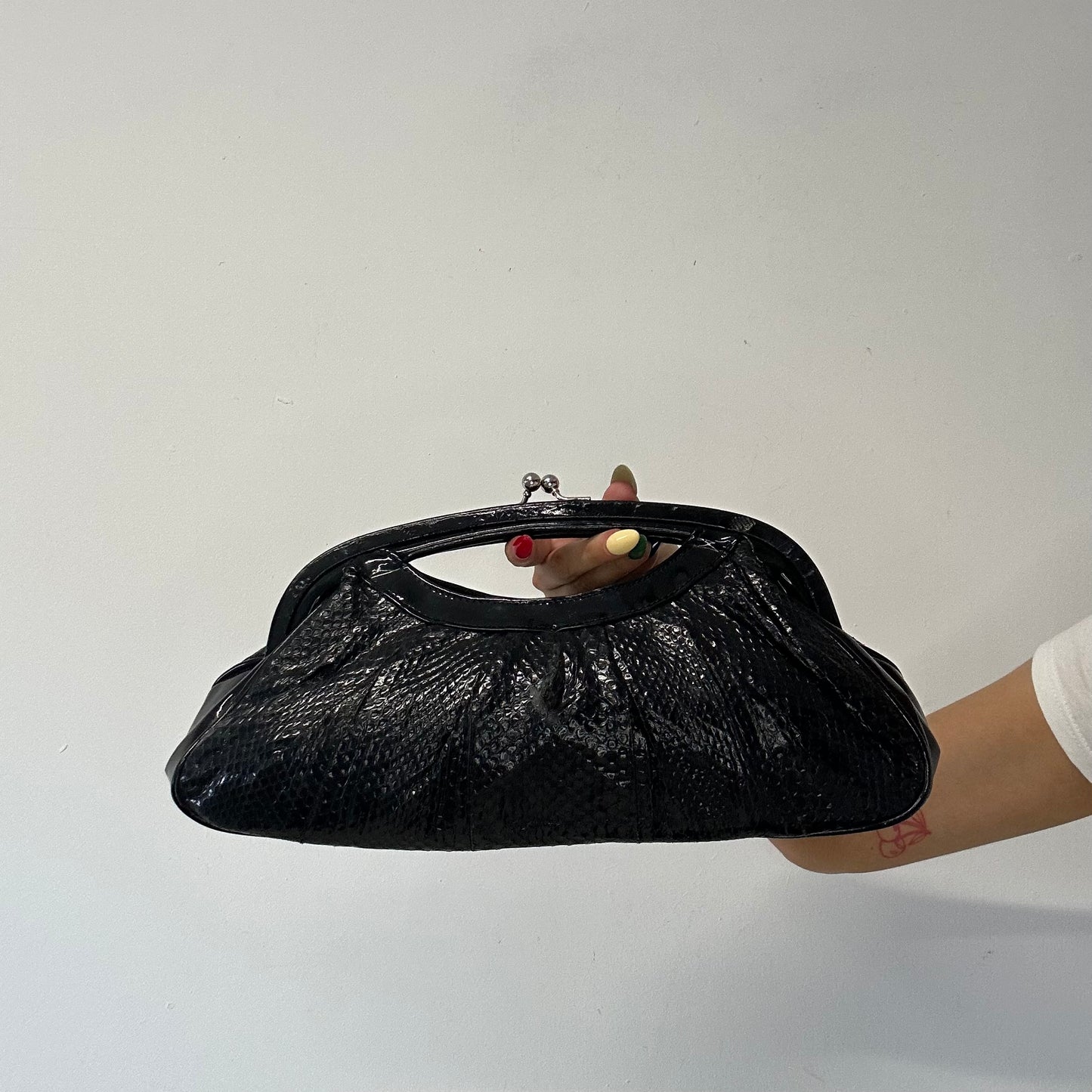 black faux leather croc effect clutch bag