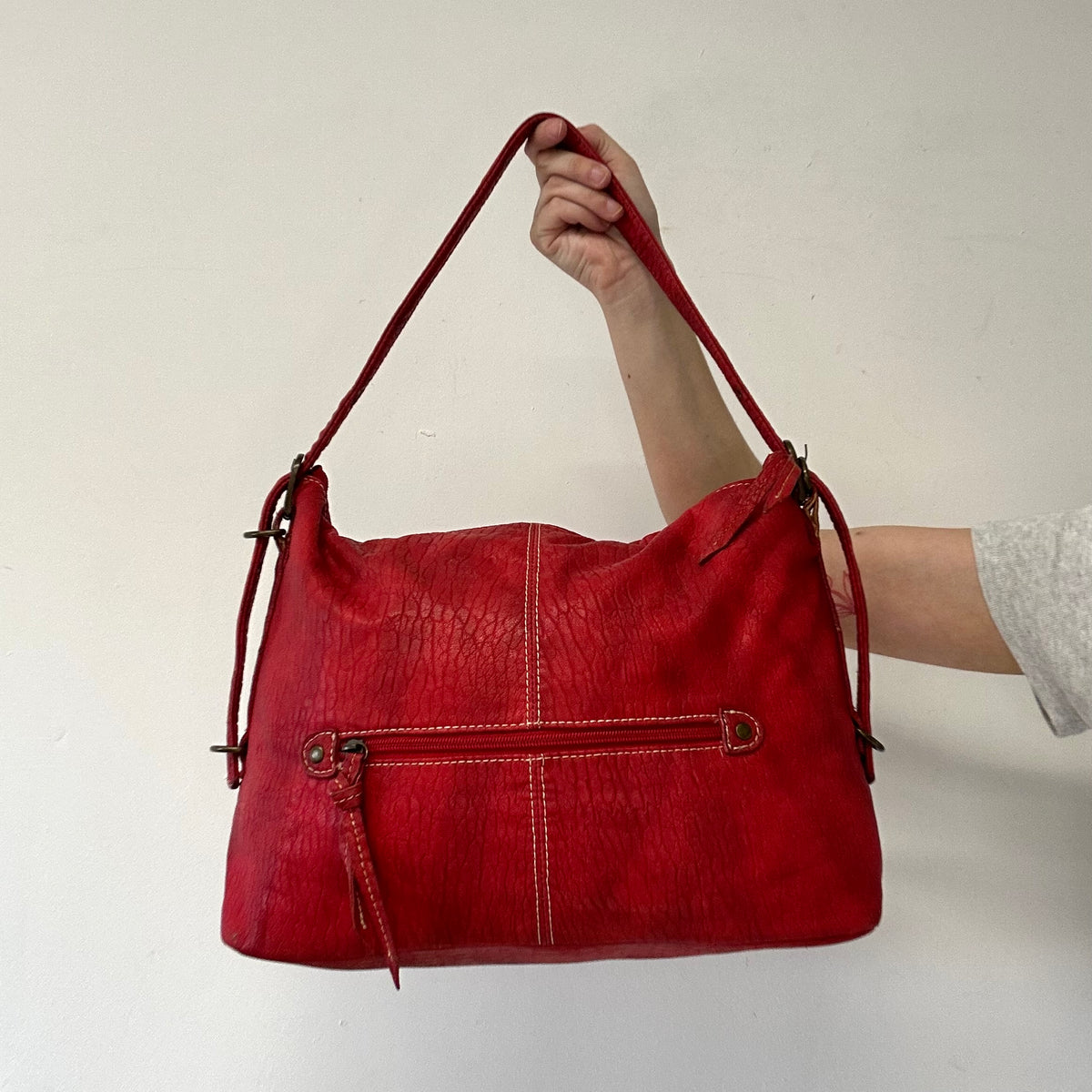 red faux leather shoulder bag