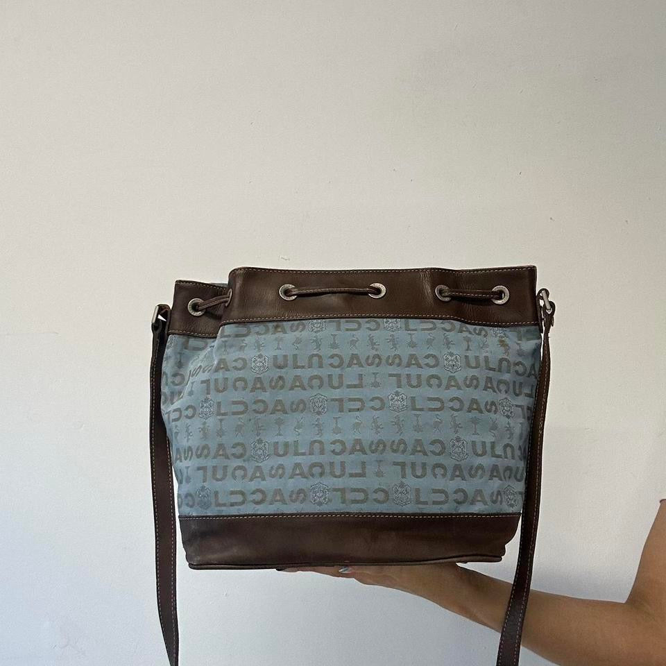 blue and brown crossbody drawstring bag