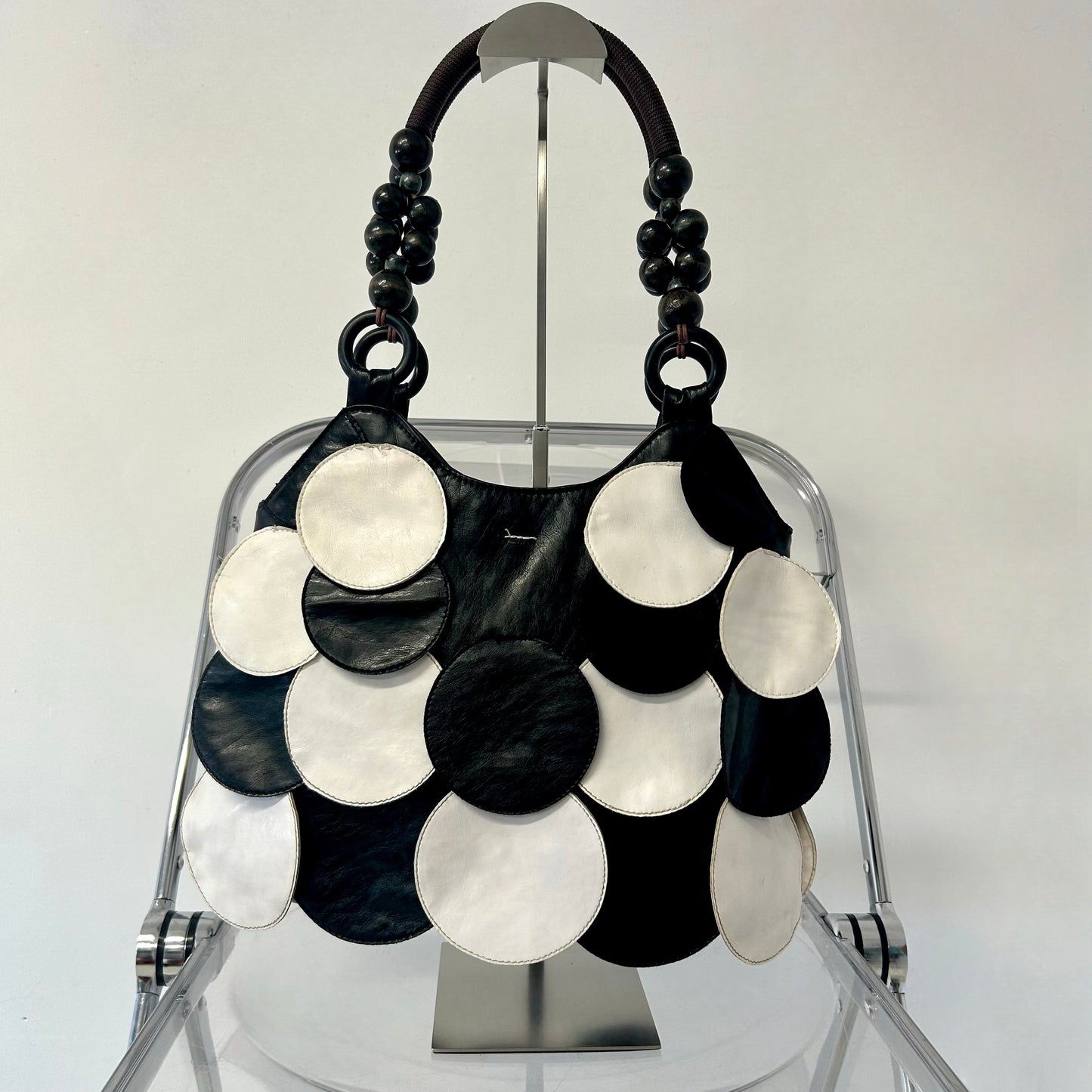 black and white faux leather disc beaded shoulder bag