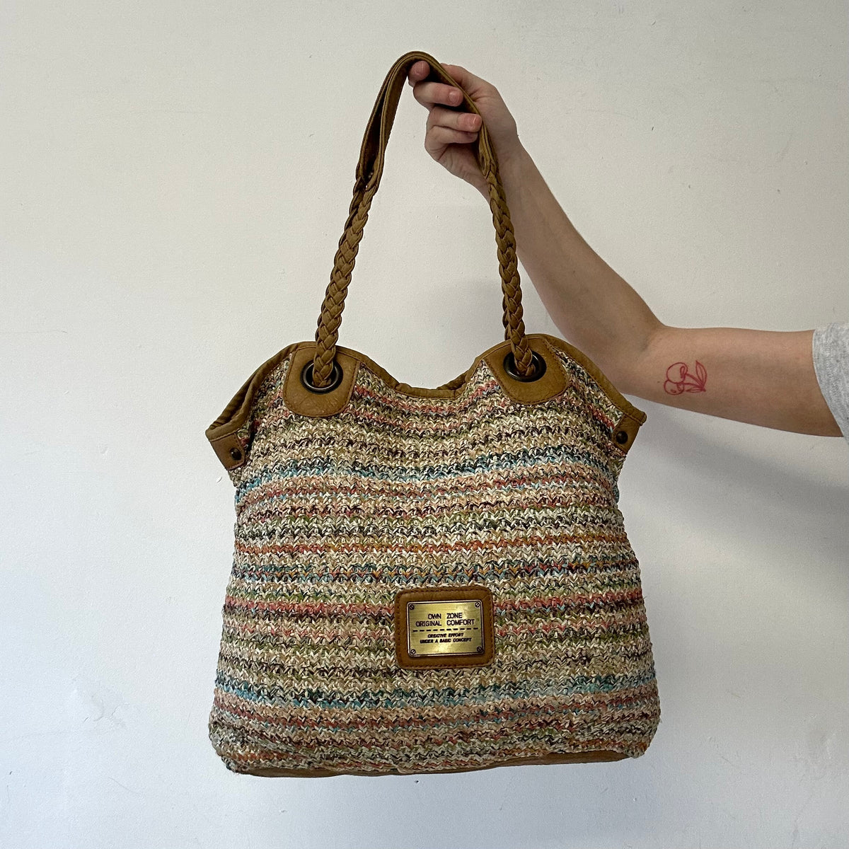 multicoloured woven beach shoulder bag