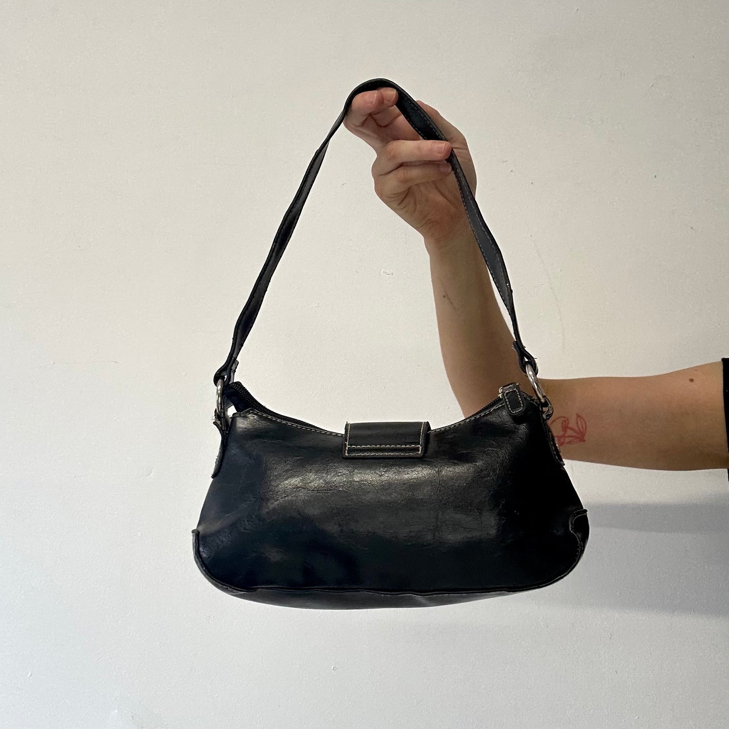 black faux leather oversized buckle shoulder bag