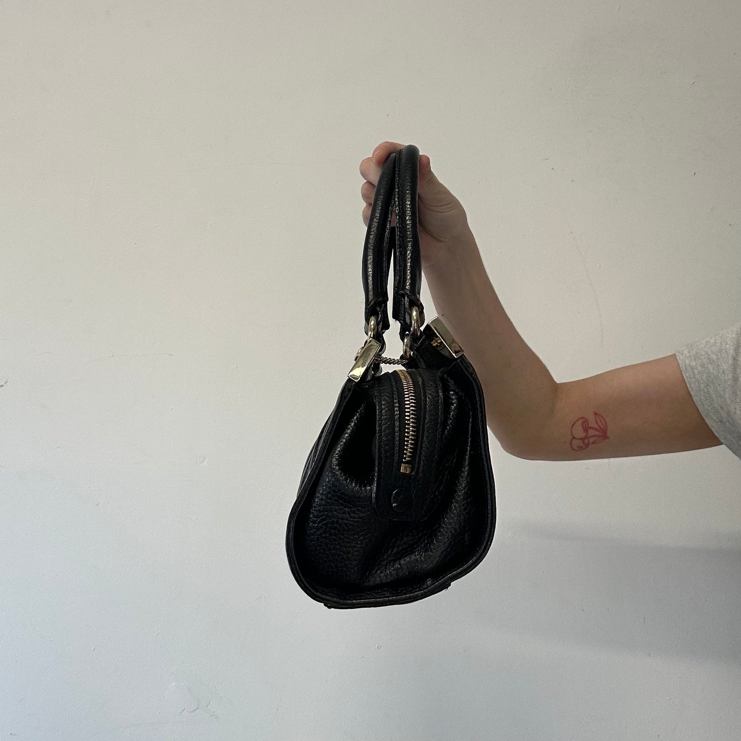 black genuine leather shoulder bag