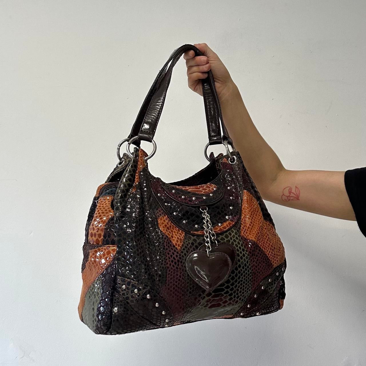 multicoloured patchworks studded faux leather shoulder bag