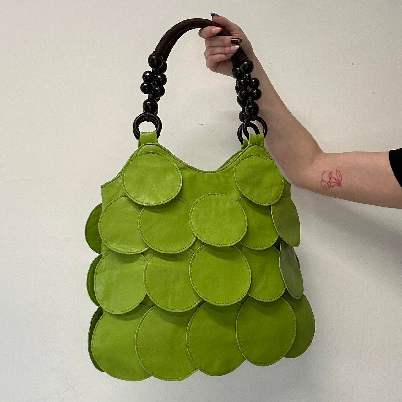 green faux leather disc layered shoulder bag