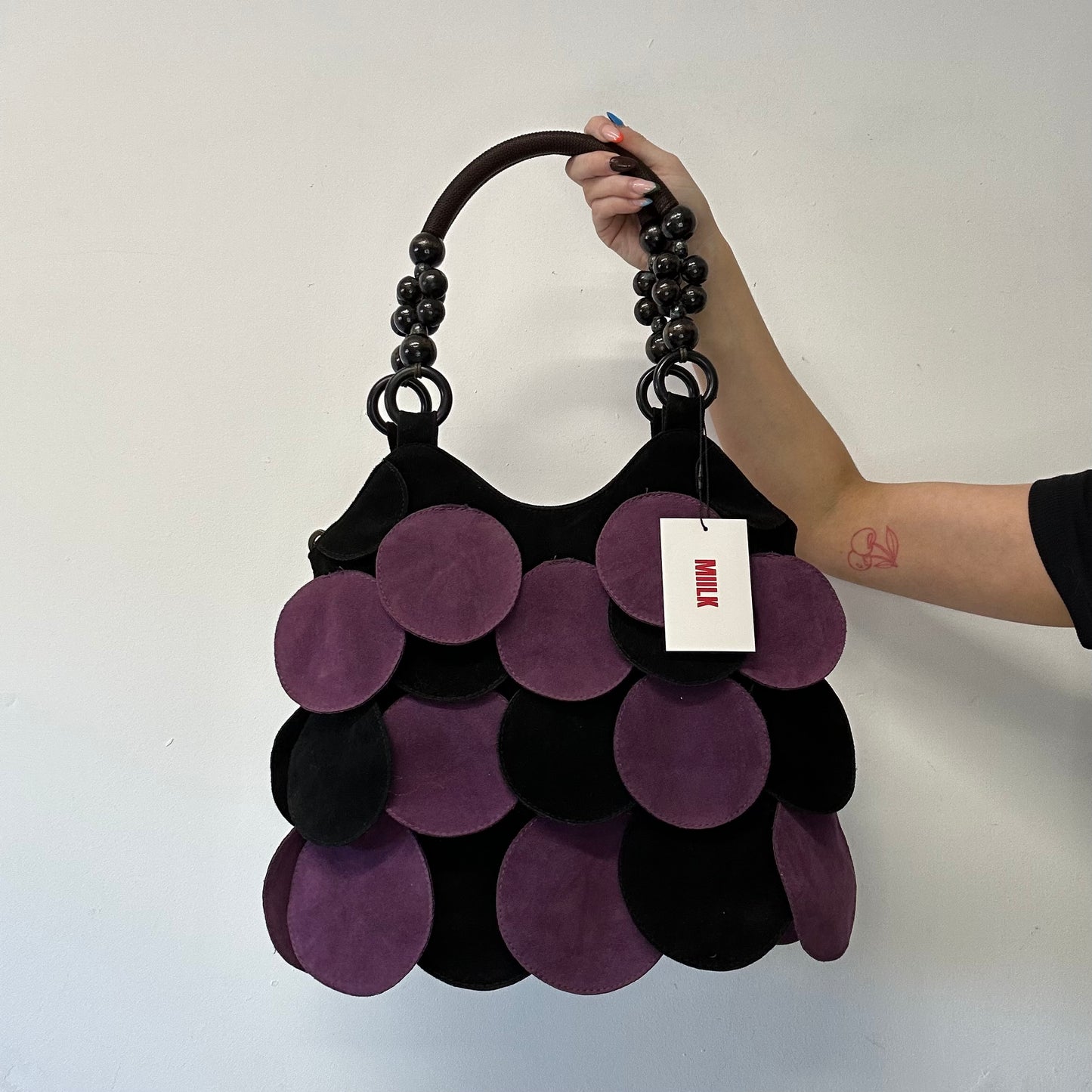 purple and black suede disc beaded shoulder bag