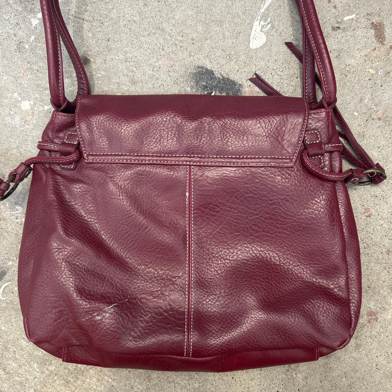 dark red faux leather western buckle shoulder bag