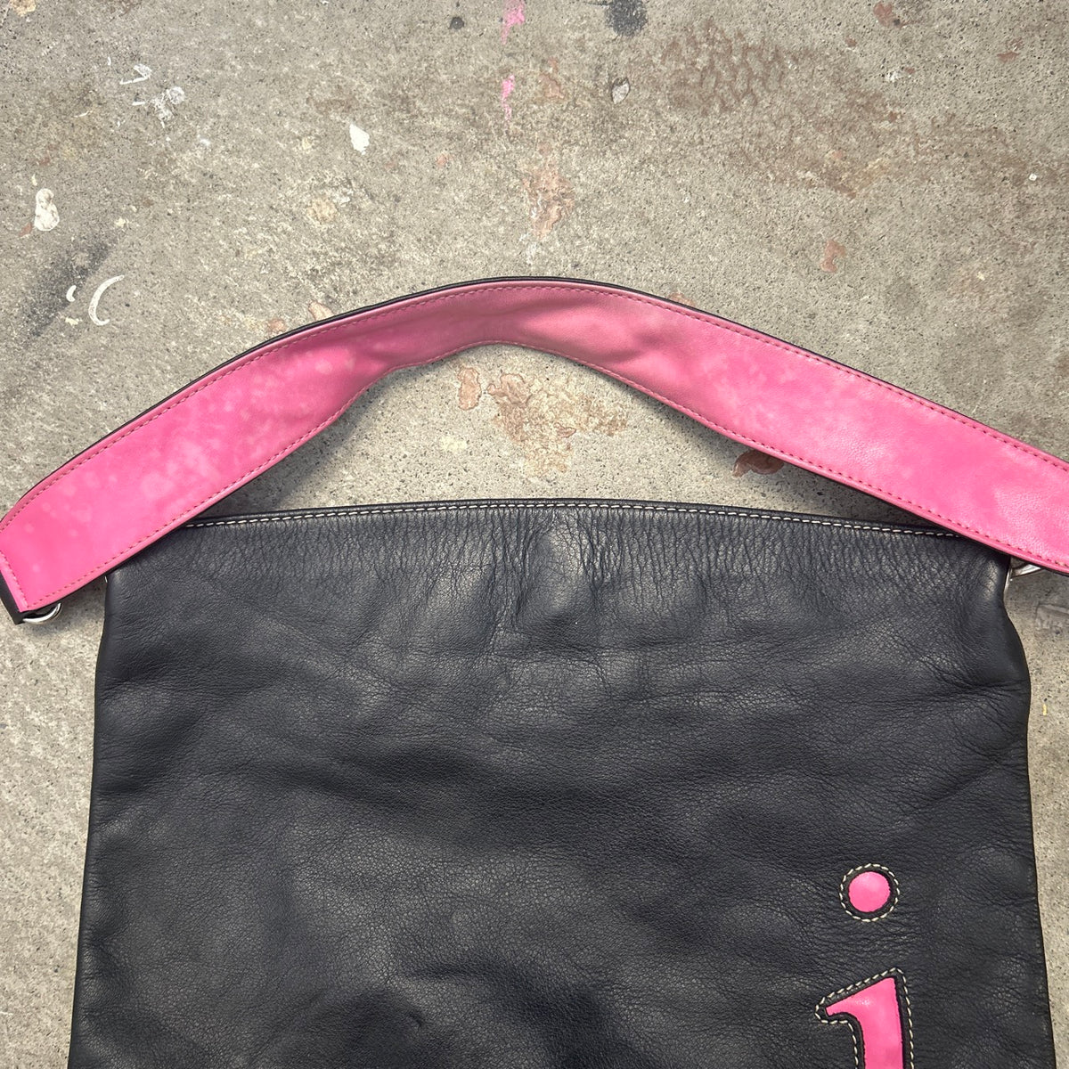 black and pink “J”  faux leather shoulder bag