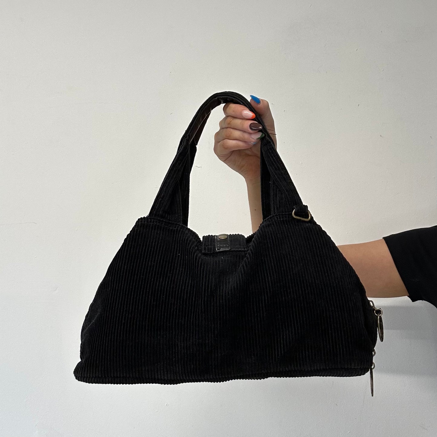 black corduroy studded shoulder bag