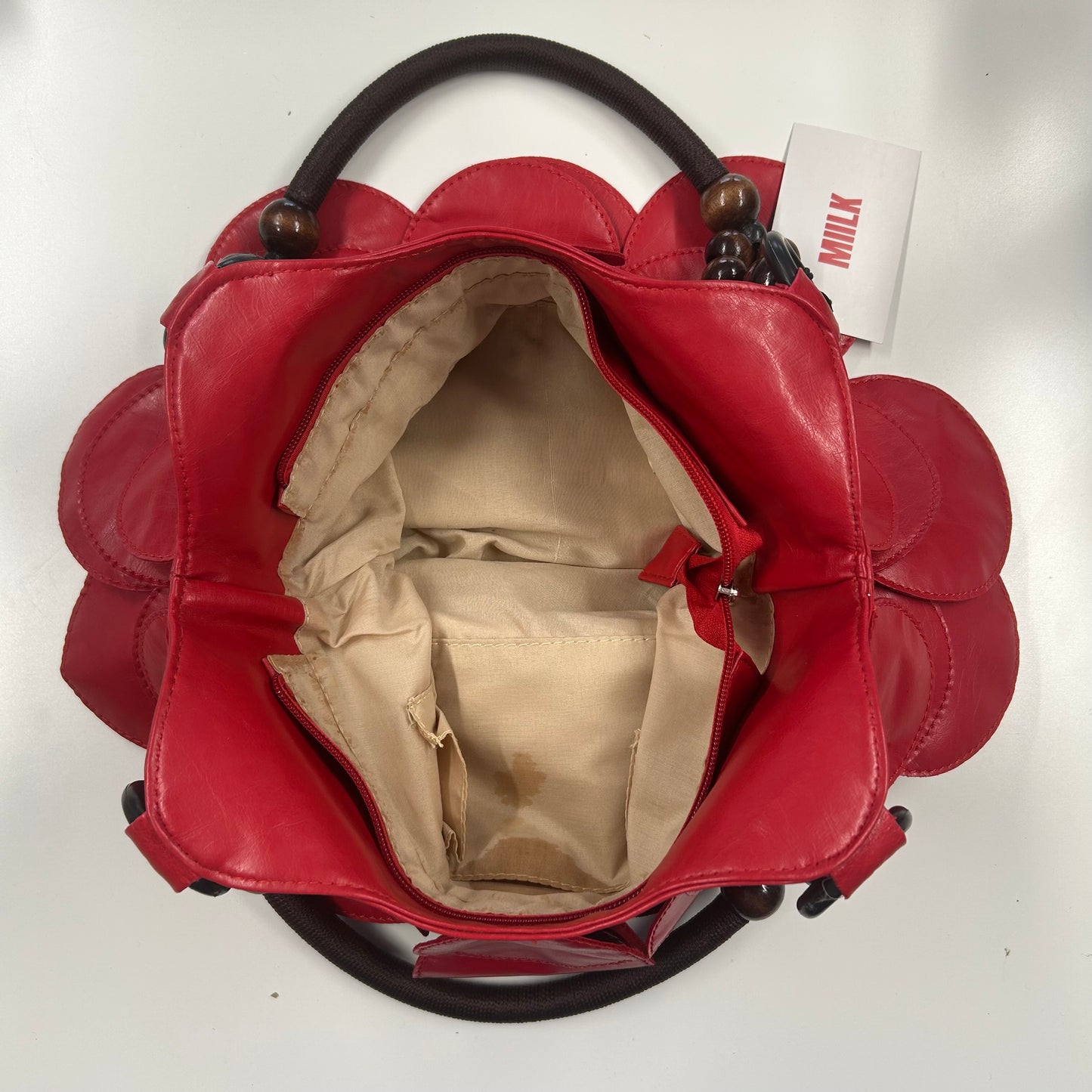 red faux leather disc beaded shoulder bag