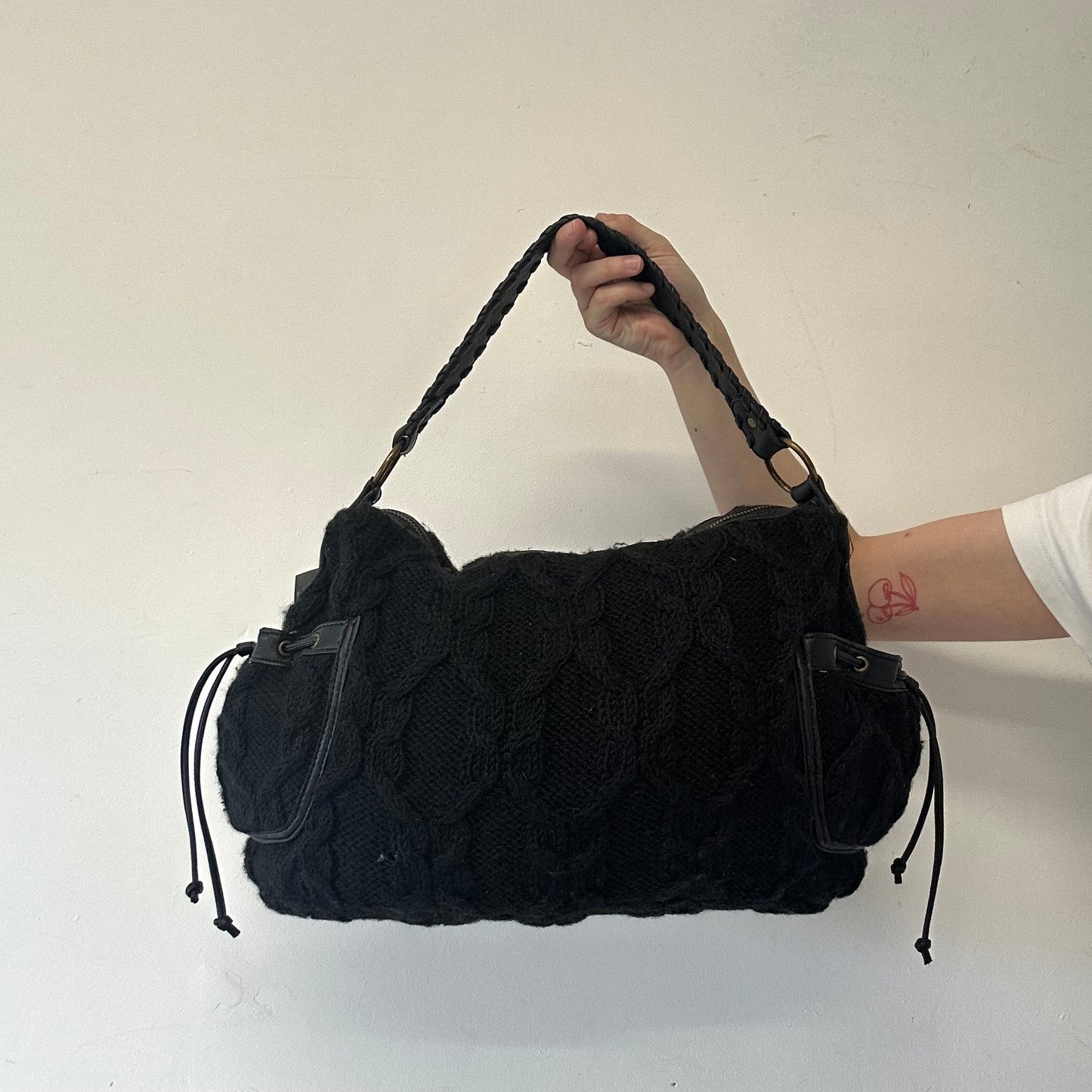 black knitted slouchy shoulder bag