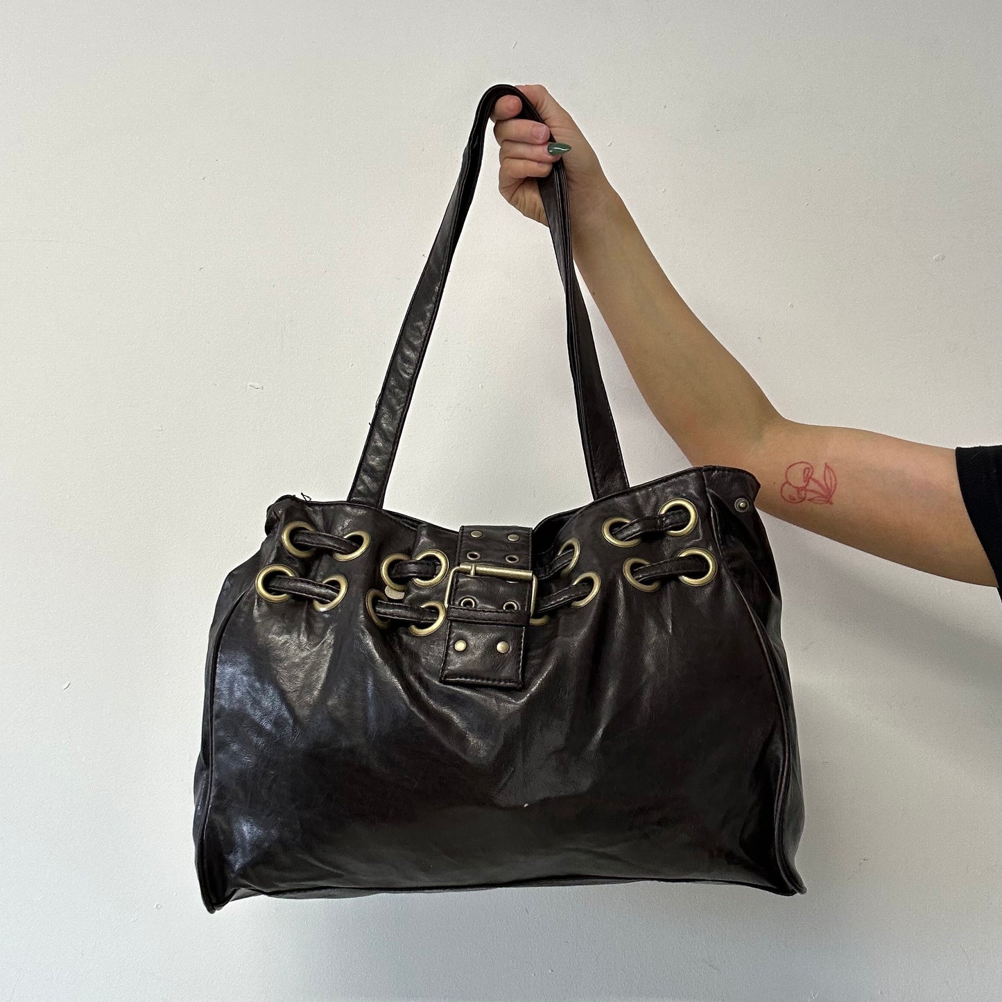 brown faux leather eyelet studded shoulder bag