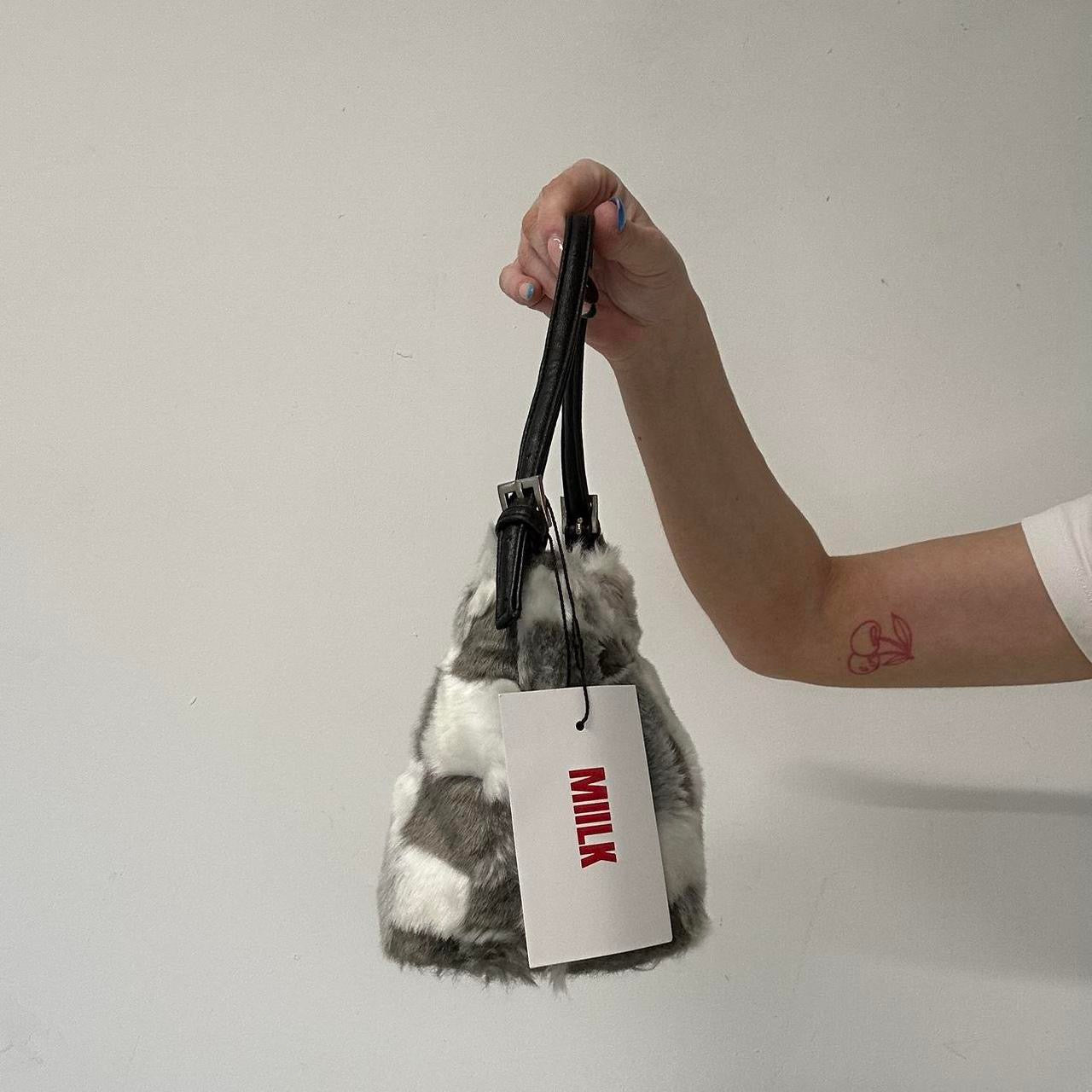 grey and white fluffy shoulder bag