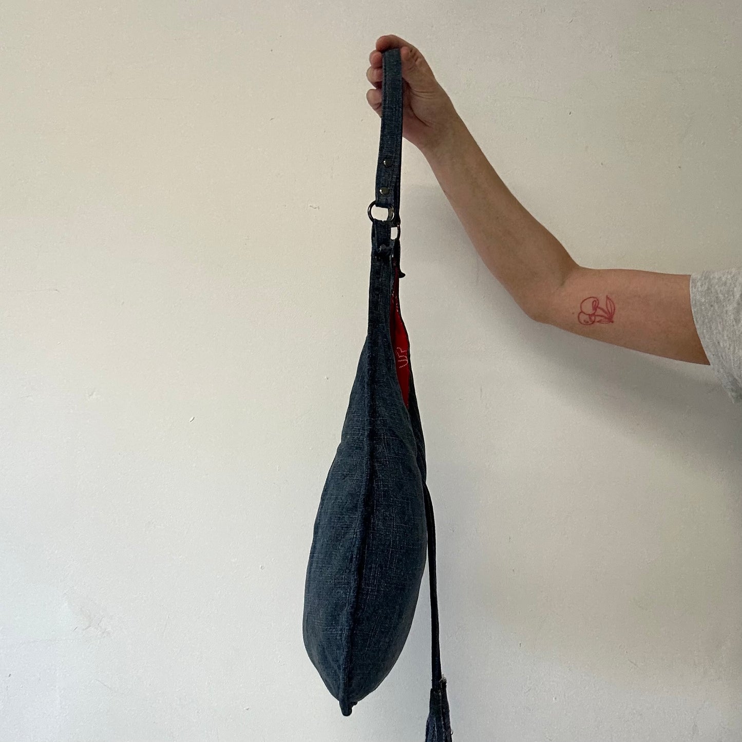 blue denim eyelet shoulder bag