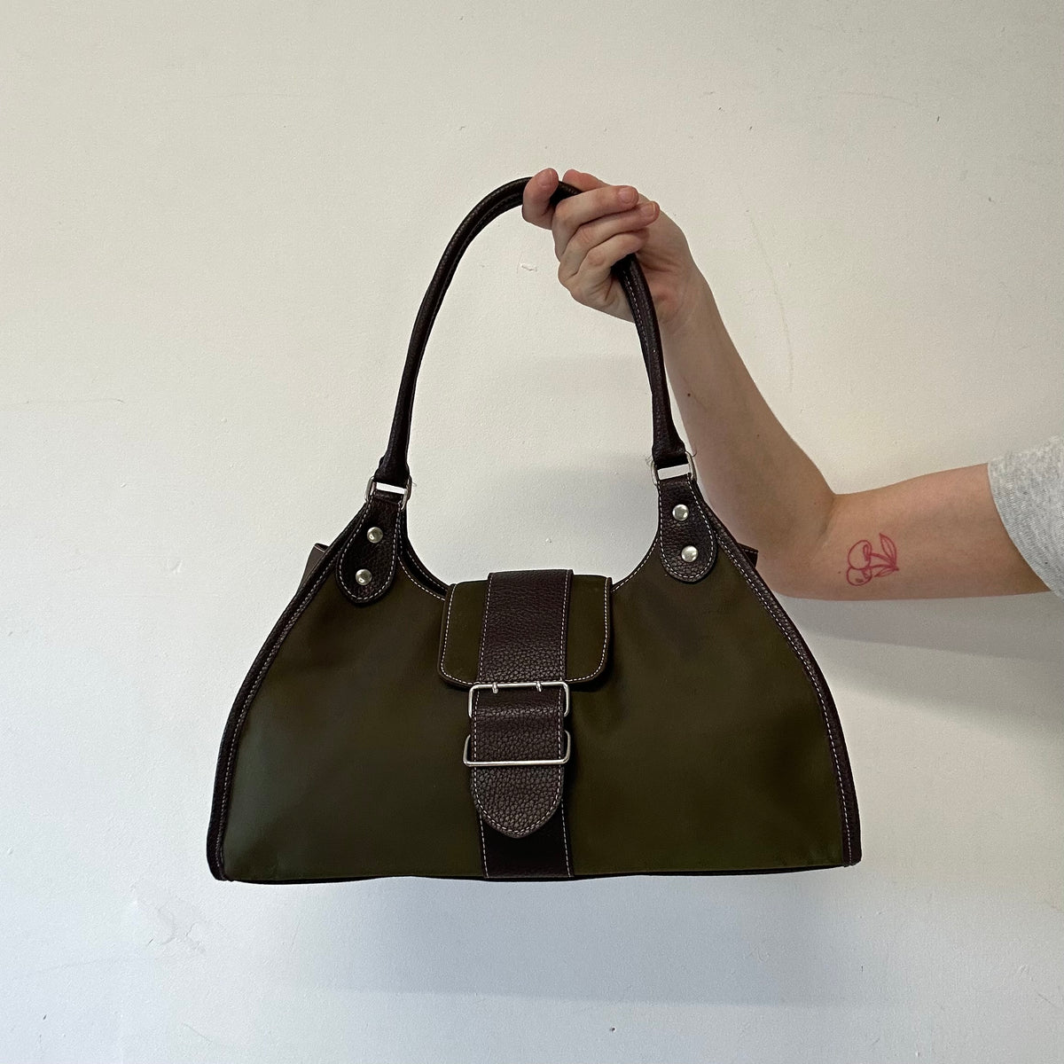 khaki canvas and brown faux leather buckle shoulder bag