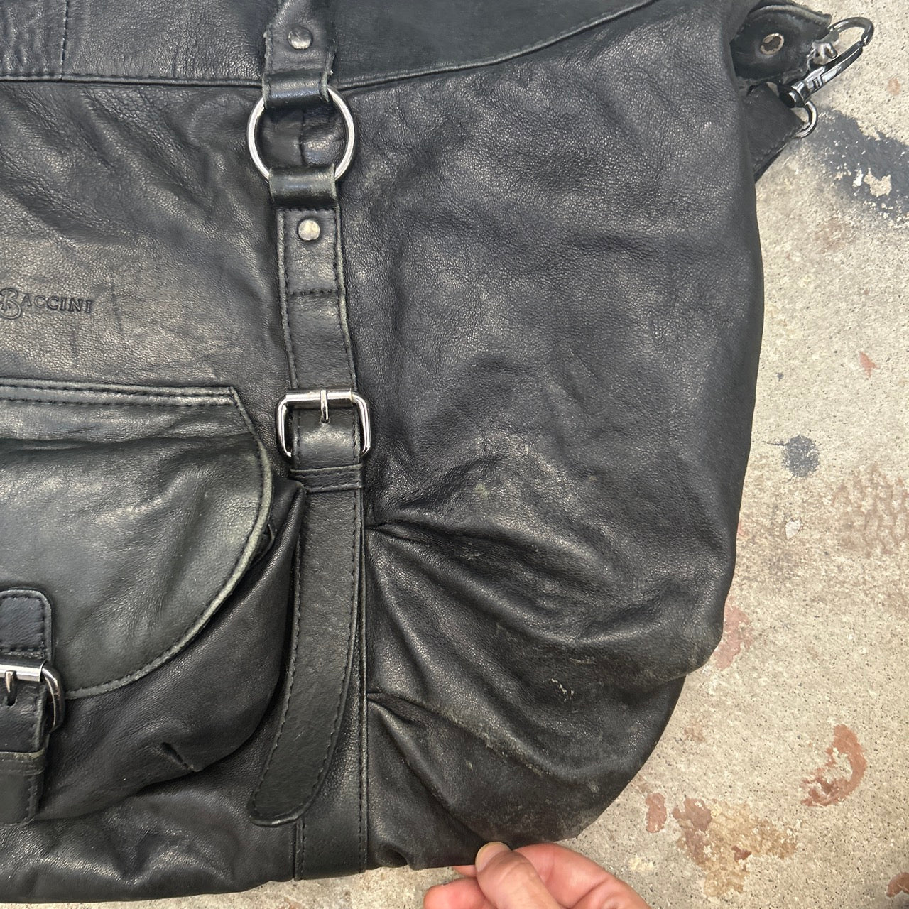black genuine leather buckle luggage bag