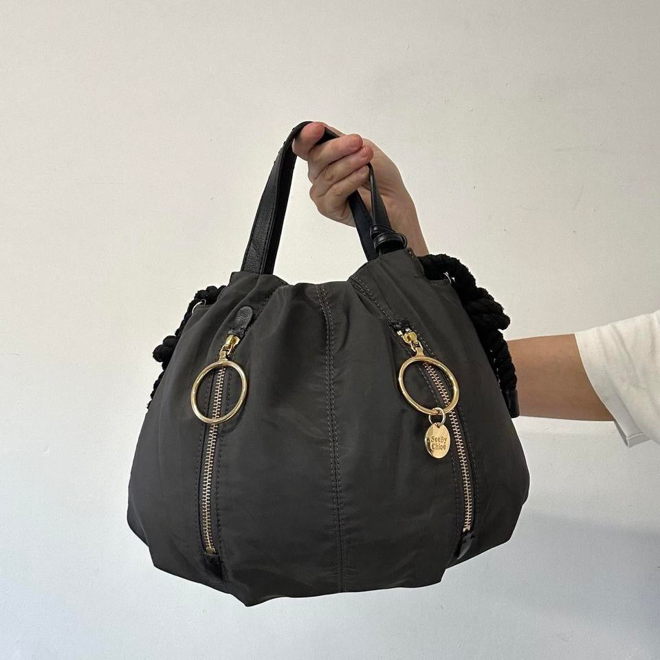 grey double zip drawstring hand bag