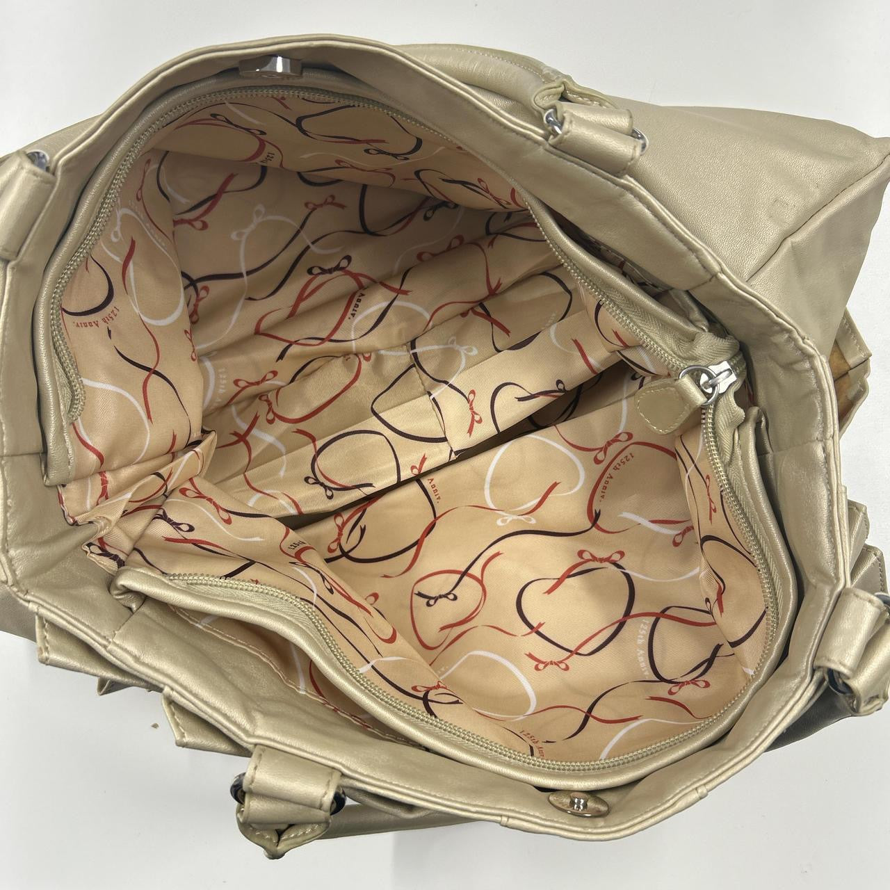 cream metallic pleated ruffled shoulder bag