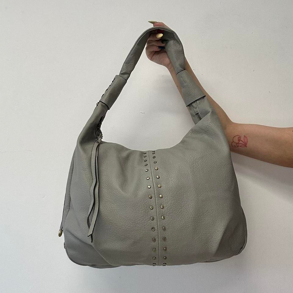 grey studded slouchy faux leather shoulder bag