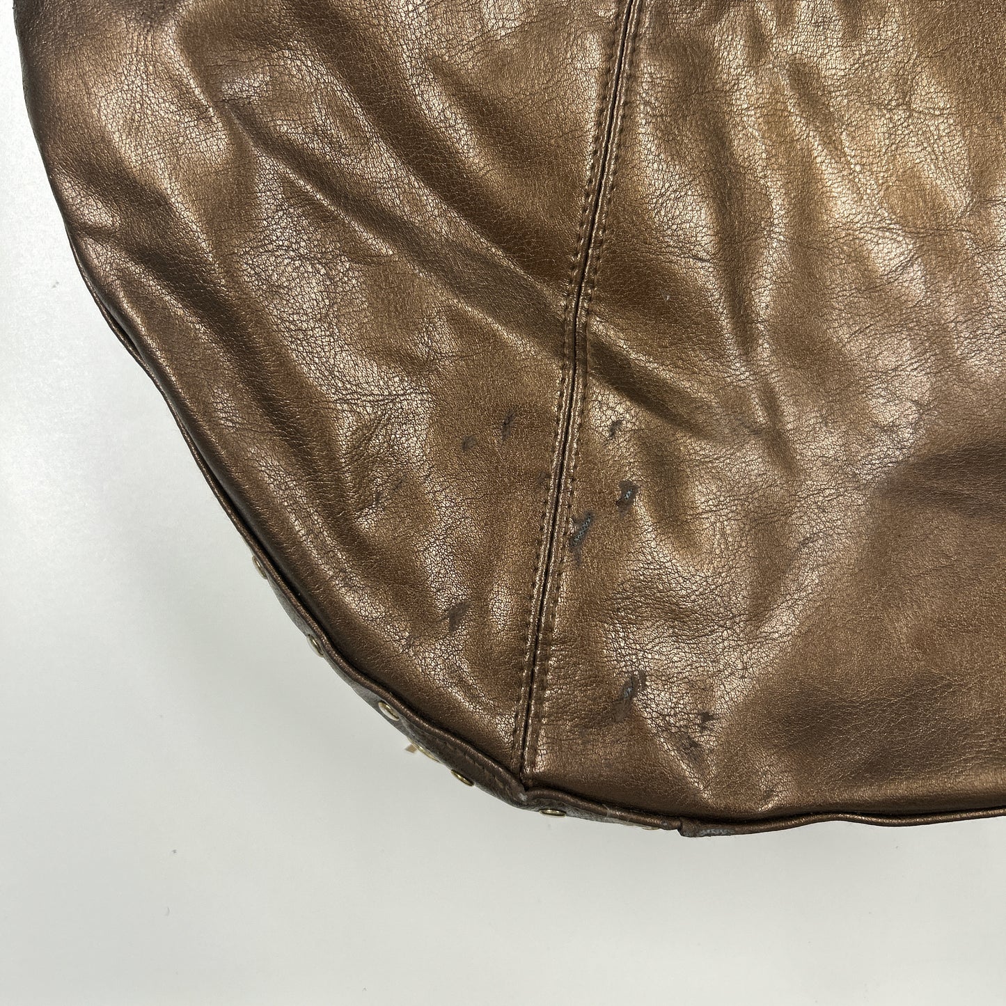 brown studded faux leather half crescent shoulder bag