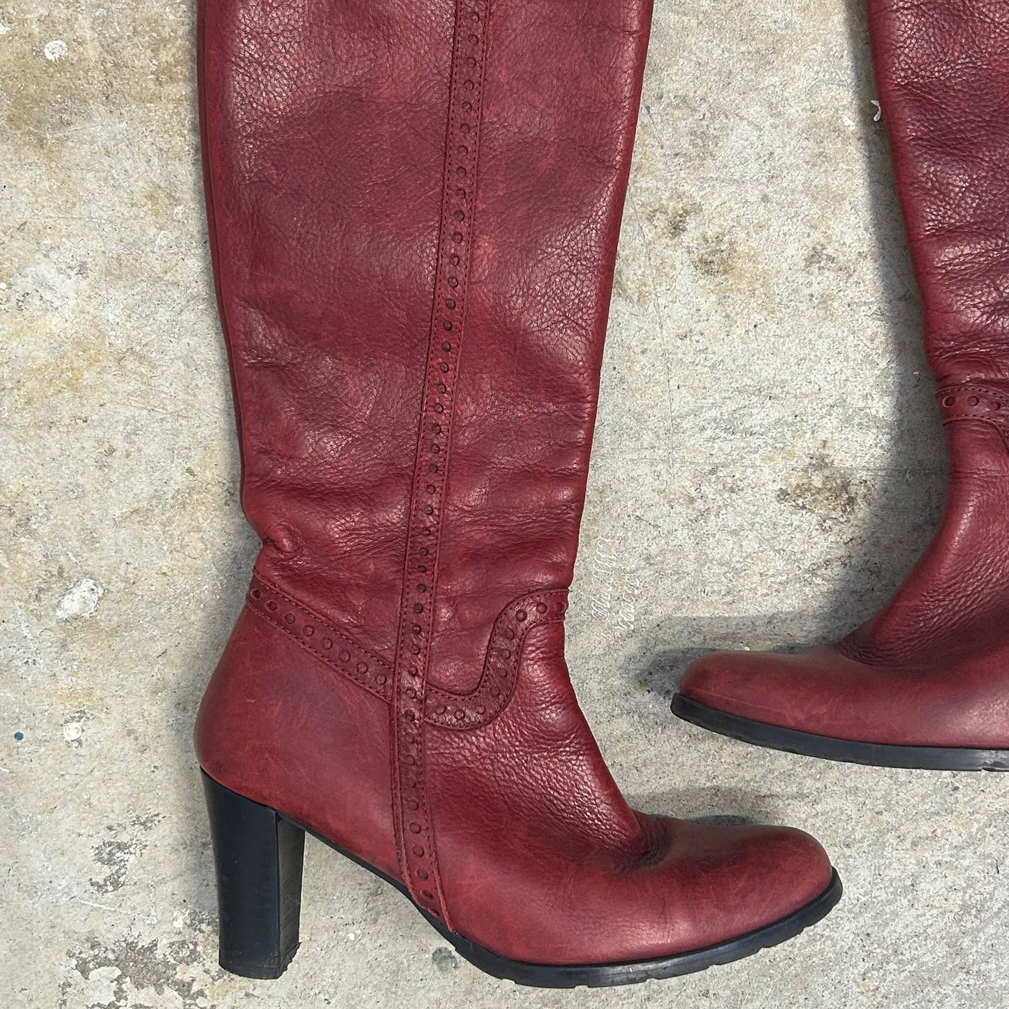 red genuine leather knee high heeled boots