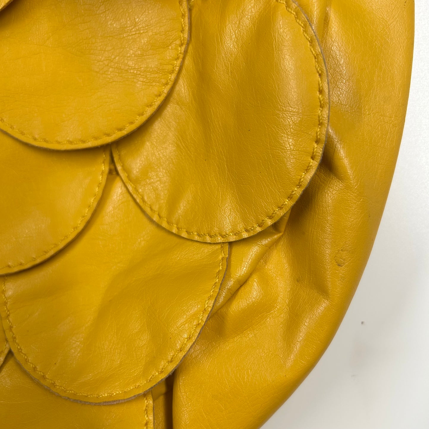 yellow faux leather disc beaded shoulder bag