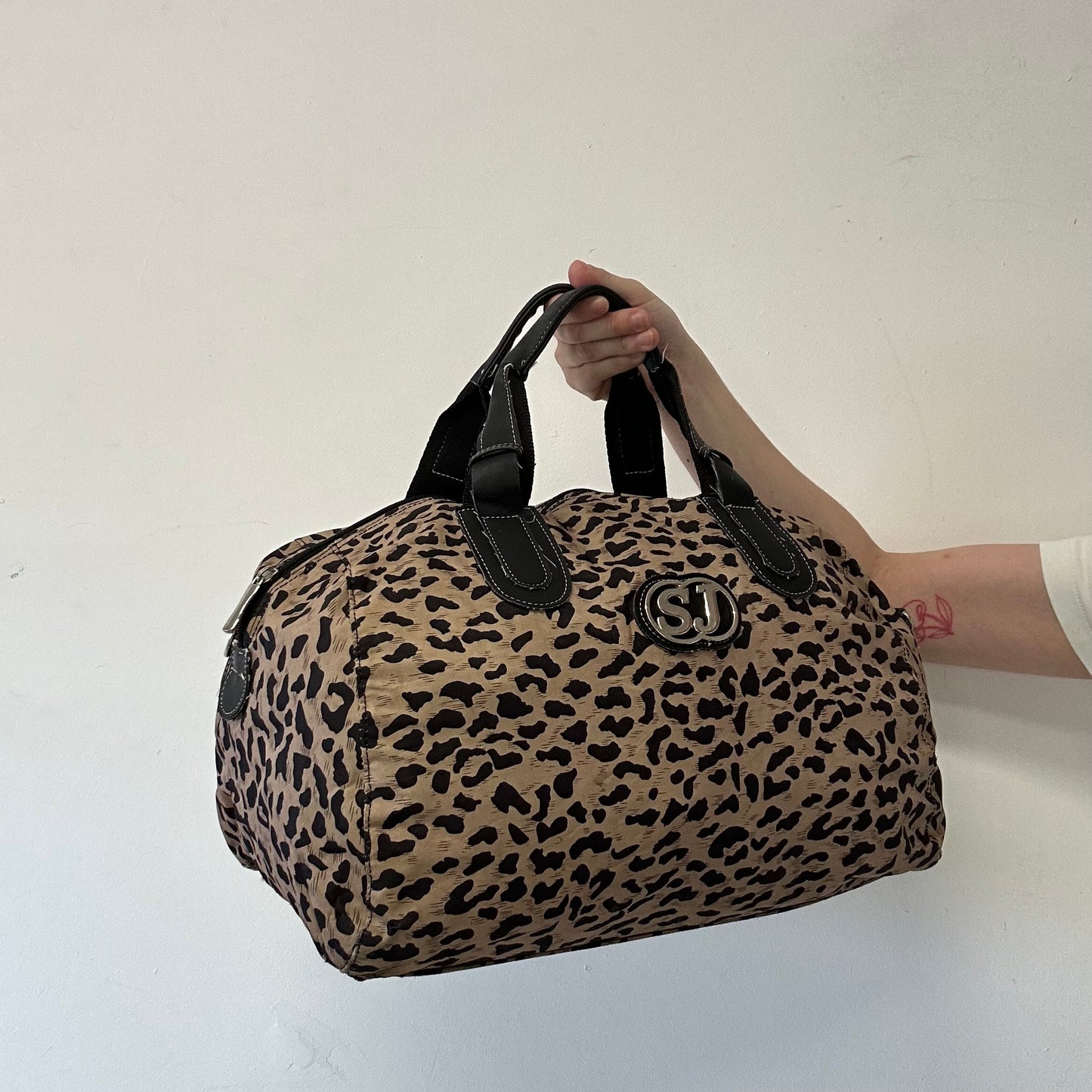 brown patterned faux leather shoulder bag