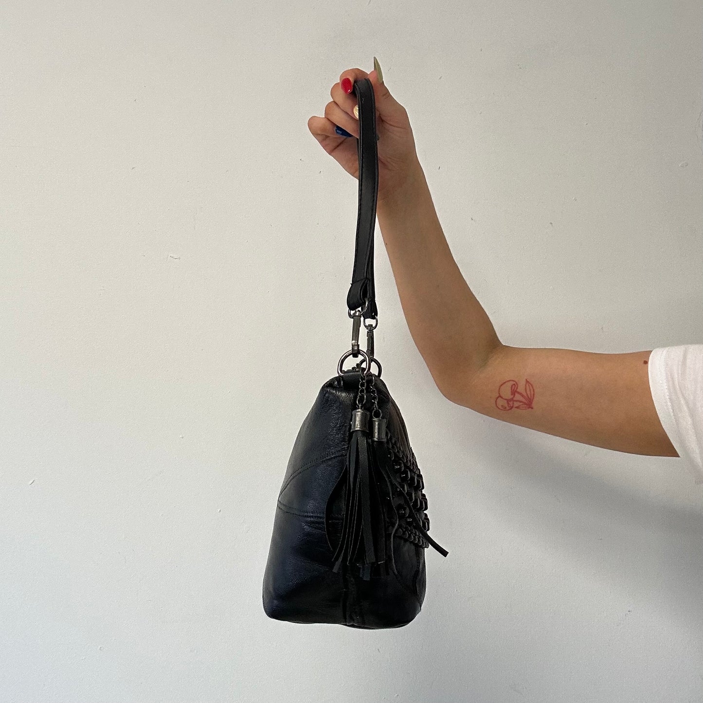 black faux leather studded shoulder bag