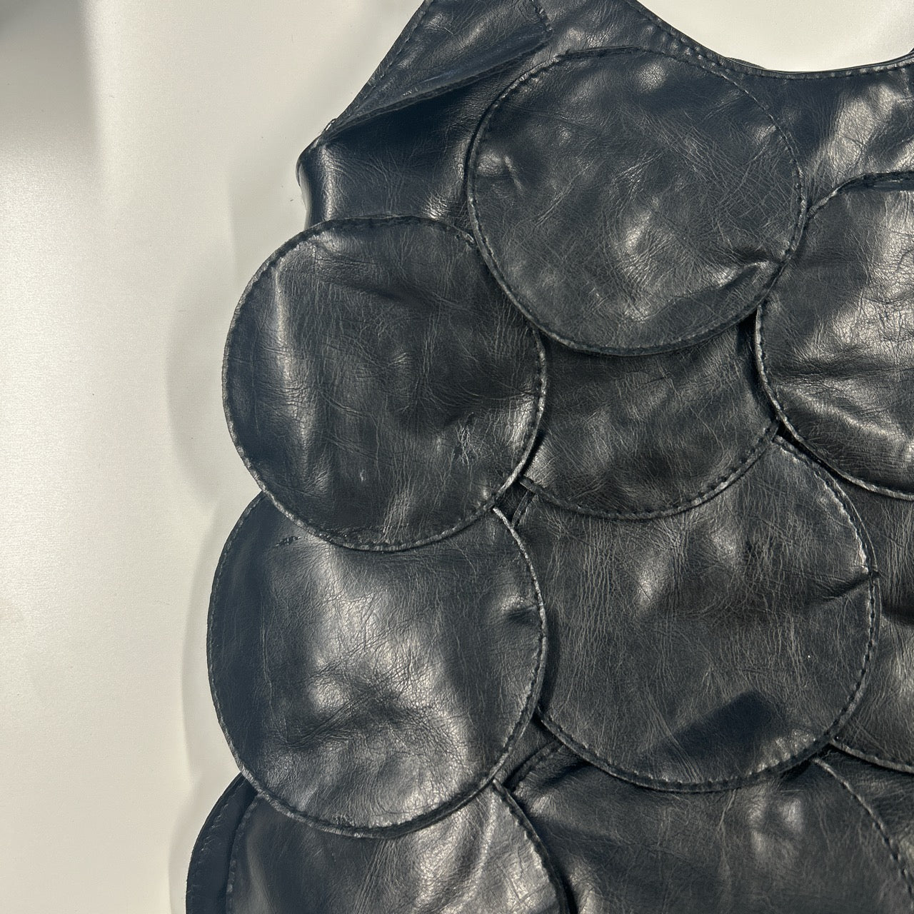 black faux leather disc beaded shoulder bag