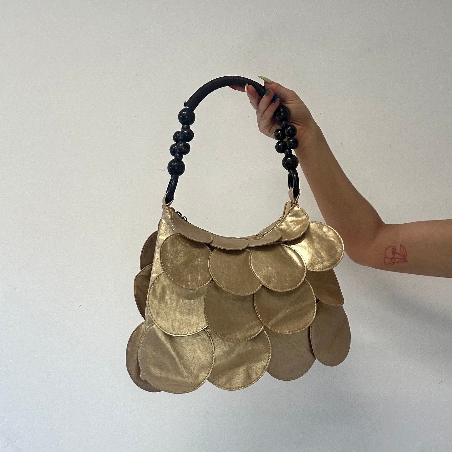 gold faux leather disc beaded shoulder bag