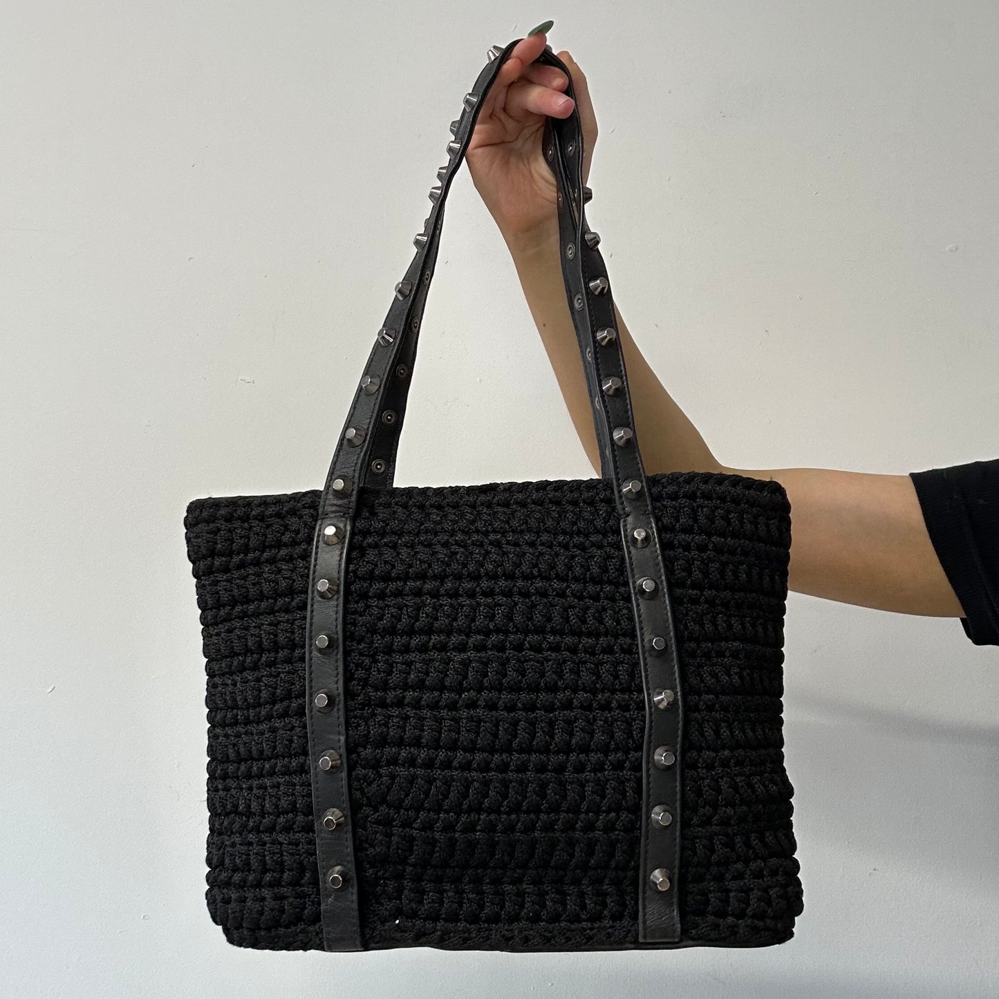 black woven studded shoulder bag
