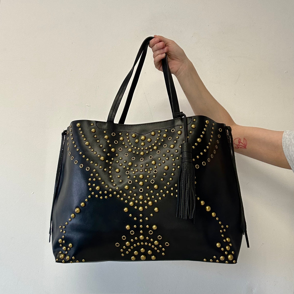 black studded eyelet large faux leather shoulder bag