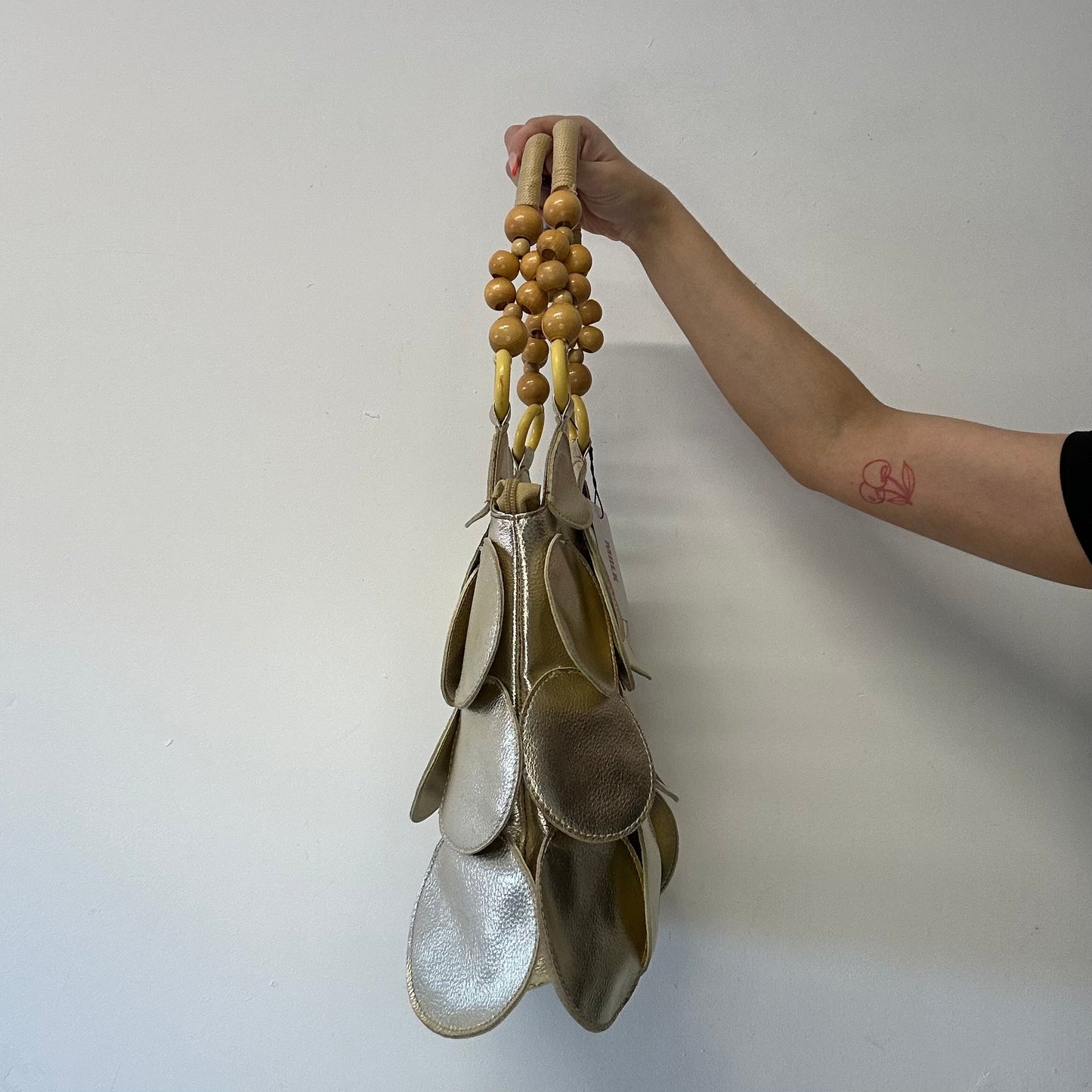 gold faux disc beaded shoulder bag